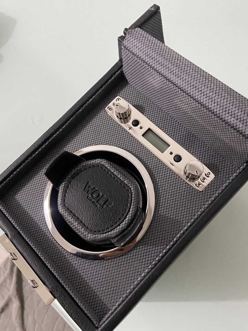 Wolf Viceroy Single Watch Winder Black 456002 (Category: Men's Watches) located in Makati City. Submitted by mightybear_3ac45c (Listing ID 1466963380, Image 1). Description: - Wolf Viceroy single watch winder in classic black -Luxary - Keeps automatic watches precisely wound and ready to wear - Premium pebbled leather finish with textured interior lining - Features a clear display window on top and digital settings screen inside - Powered by incl