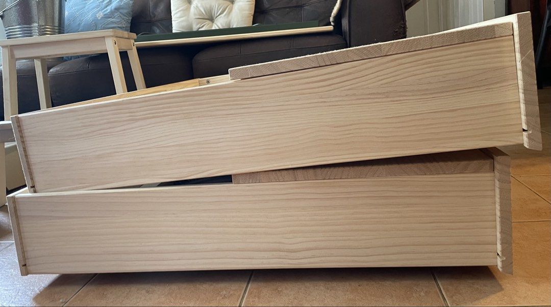 Wooden Storage Boxes with Wheels (Category: Storage Boxes & Baskets) located in Taguig. Submitted by neko_mom_of (Listing ID 1466882316, Image 3). Description: Brand: IKEA Glamberget 2 bed storage boxes and 2 trays made of solid pine wood Price: Option 1: ₱3,500 for the two storage boxes and two trays Option 2: ₱2,000 for one storage box and one tray Mode of Payment: GCash How to get the item: Option 1: Pick up at Acacia Estates, Taguig City, Met