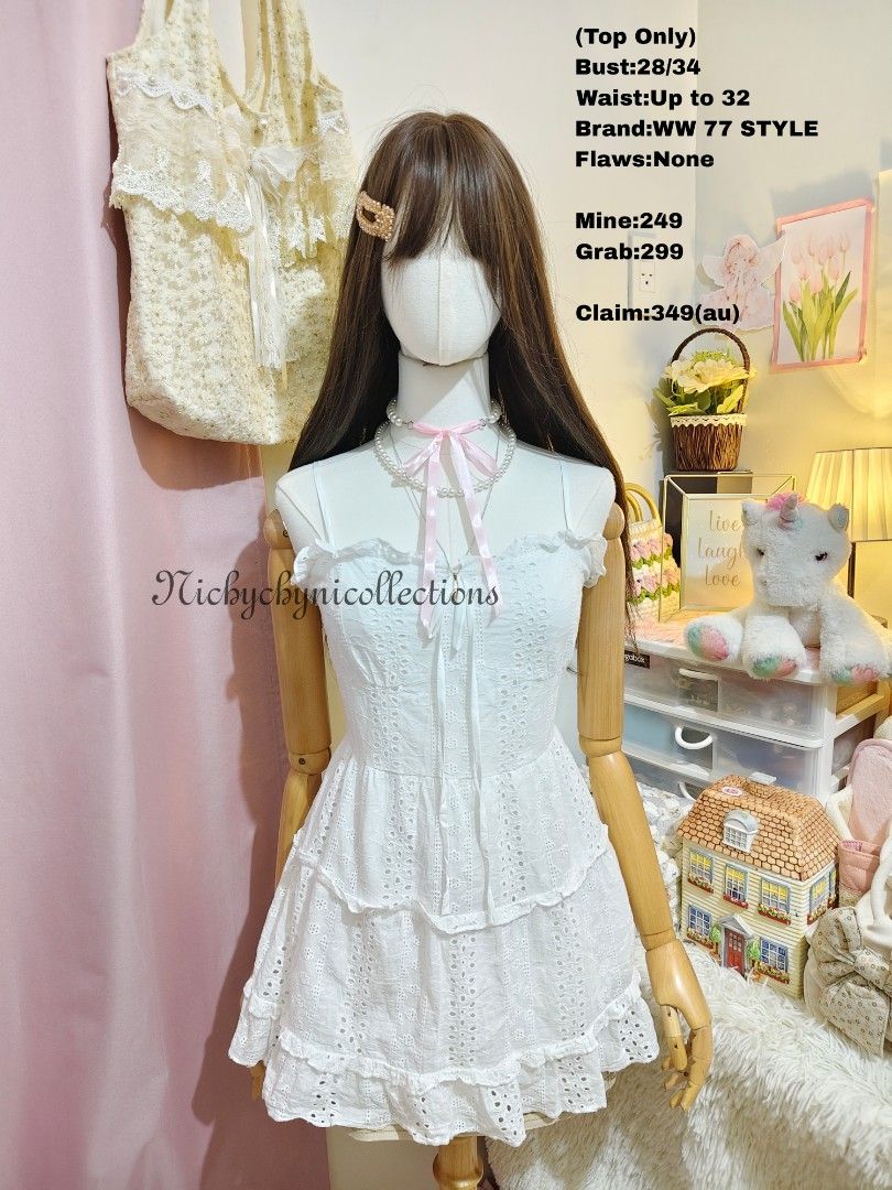 WW 77 STYLE White Eyelet Top (Category: Blouses) located in Manila. Submitted by chynii_28 (Listing ID 1466867572, Image 1). Description: - Brand/Style: WW 77 STYLE white eyelet top - Condition: 10/10, zero flaws found on fabric - Fit: Bust 28 to 34 inches, waist up to 32 inches - Features: Adjustable spaghetti straps, sweet ruffled neckline, and front tie ribbon - Details: Layered ruffle hem with intricate cut-out patterns throughout - Perfect f