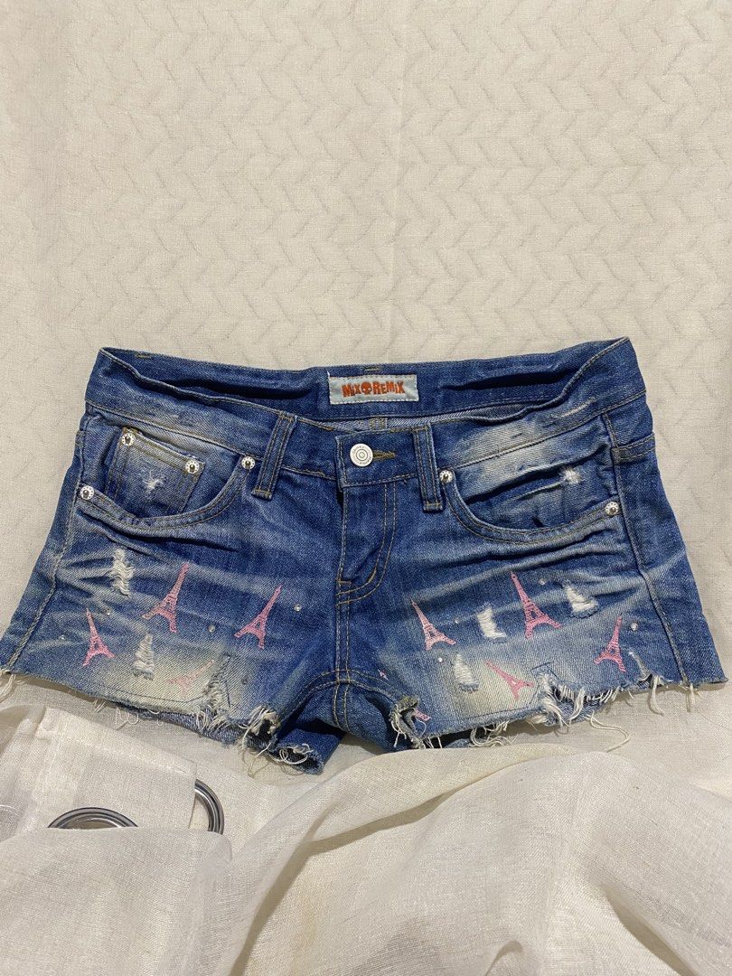 Y2K low-rise distressed denim micro shorts (Category: Shorts) located in Marilao. Submitted by kyssmarila (Listing ID 1466857163, Image 1). Description: — Size: Natural waist: 25” but because its low rise the exact waist measure is 28-29” — Rise: 6.5” — Length: 8.5” — Condition: 9/10 — Flaws: None.
