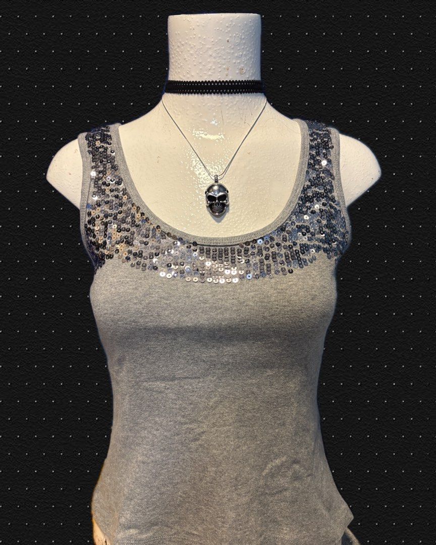 Y2K McBling Heather Grey & Silver Sequin Ribbed Tank Top (Category: Sleeveless) located in Quezon City. Submitted by zieliv (Listing ID 1466967783, Image 1). Description: DECLUTTERING! ☠️ Kindly read the description before inquiring. If interested, send me a message. Get or pass is appreciated. °+* For sale preloved items! *+° Mine now and pay within 24 hrs after invoice. ITEM DETAILS: • Style: Y2K / McBling Silver Sequin Panel Ribbed Scoop Neck 
