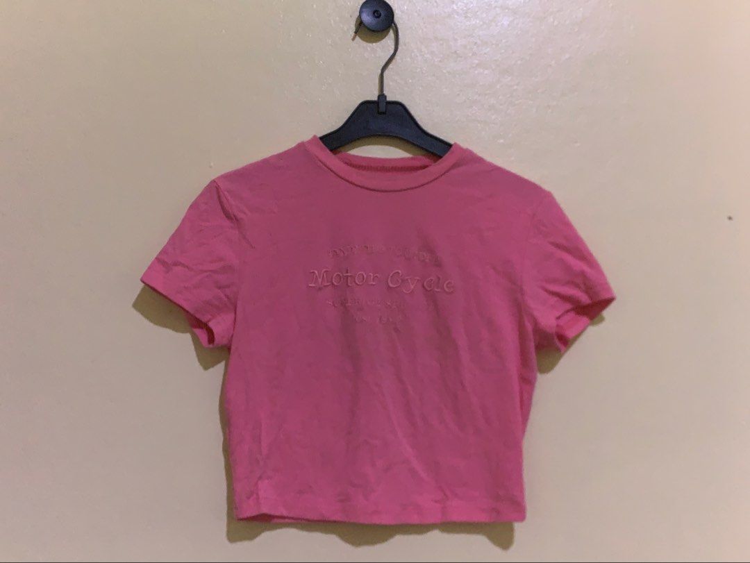 Y2K pink top with embroidered graphic design (Category: Shirts) located in Taguig. Submitted by liandeclutters (Listing ID 1466885196, Image 2). Description: Good as new! Only used this once a few years back. Only selling bcos I don’t wear crop tops anymore : ) 📍Taguig City.