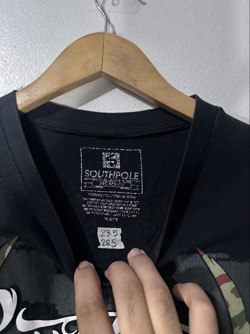 y2k Southpole double sided shirt (Category: Formal Shirts) located in Sarrat. Submitted by villtage (Listing ID 1466958771, Image 3). Description: -Washed and ready to wear -Dimes 23.5x28.5 -Issue: Hairlines and cracks.