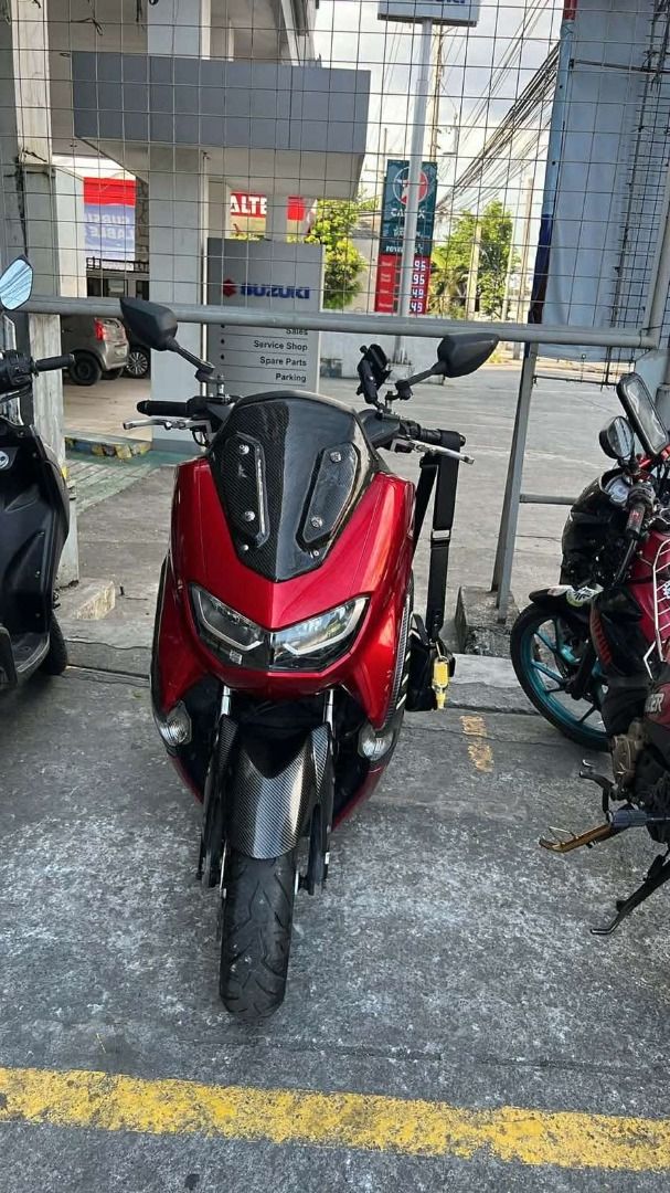 Yamaha NMax V2 2022 Model Red Scooter (Category: Motorbikes for Sale) located in Quezon City. Submitted by idyllicfinds (Listing ID 1466868768, Image 1). Description: New rear suspension TRC, with free LS2 Helmet (used) Negotiable for sure buyers Location: Don Antonio, Commonwealth Ave., Quezon City Call/Text here: 09972101717.