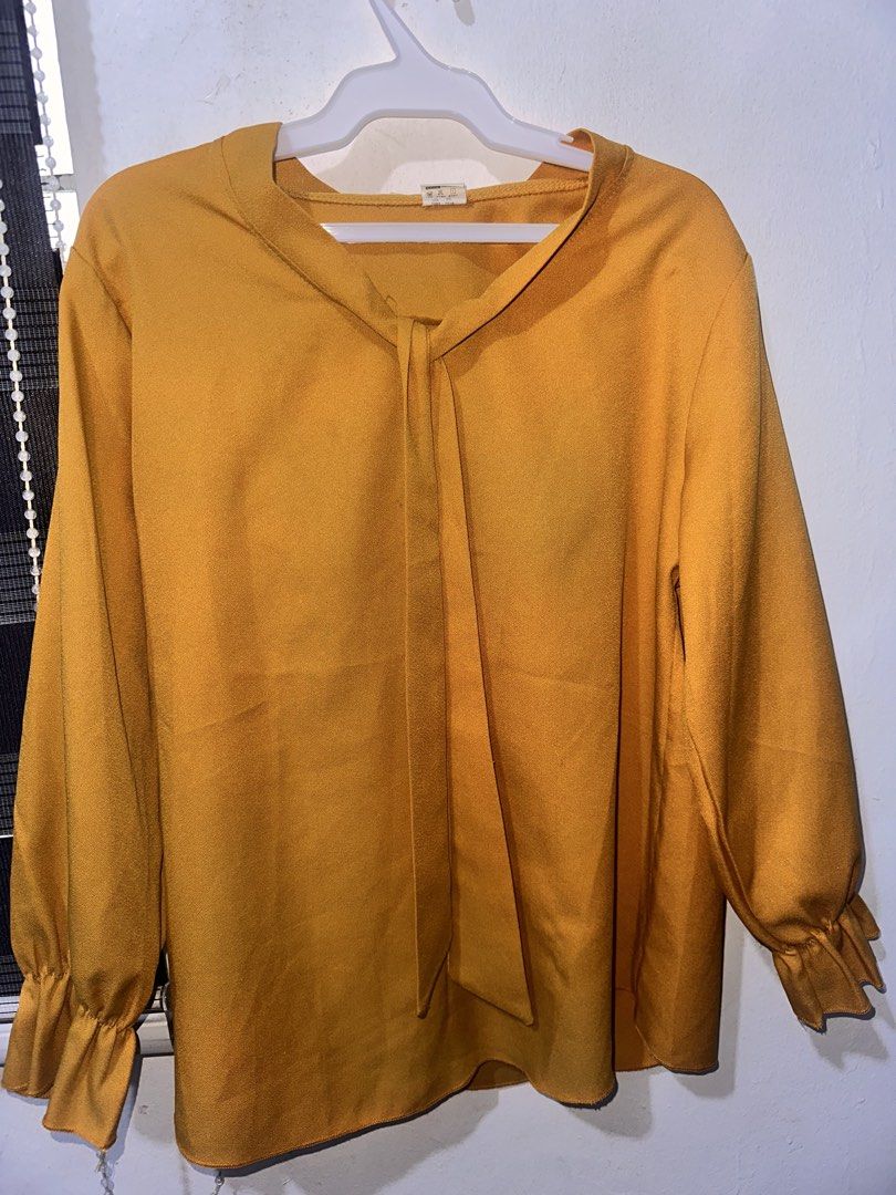 Yellow blouse with tie in front (can ribbon) (Category: Blouses) located in Batangas. Submitted by oddflower.582653 (Listing ID 1466860157, Image 1). Description: 📌 Santa Rosa Laguna Best fit medium.