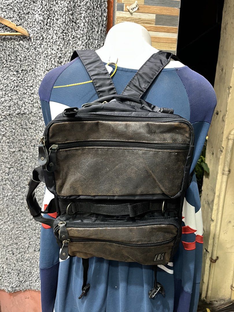 Yoshida & Co. Porter 3-Way Briefcase (Category: Backpacks) located in General Trias. Submitted by zrchustle.604 (Listing ID 1466969516, Image 3). Description: Yoshida & Co. Porter 3-Way Briefcase, highly versatile and convertable across three distinct carrying styles: • Briefcase: Hand-carried vertically or horizontally using the main top handles. • Shoulder Bag: Worn across the body by clipping a long shoulder strap to the integrated side rings.