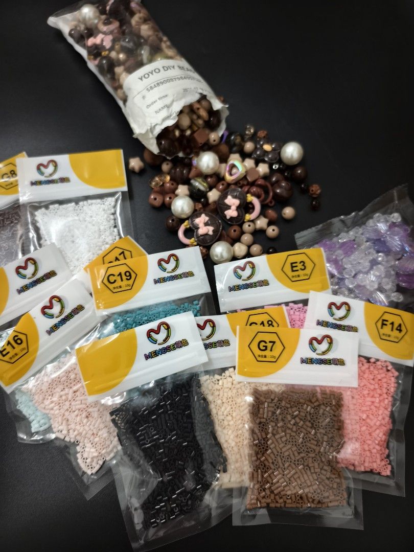 Yoyo DIY Bead Craft Set with Assorted Colors (Category: Craft Supplies & Tools) located in Angeles City. Submitted by measaliman02351 (Listing ID 1466857239, Image 1). Description: - Massive DIY crafting bead collection for all your creative projects - Includes one large bag of mixed charms, pearls, and brown beads - Comes with multiple small packets of perler fuse beads (approx. 10g each) - Solid colors include white, black, brown, pink, blue, a