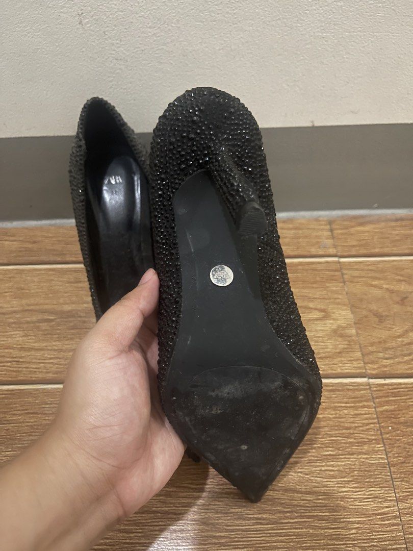 Zara Black Rhinestone Pointed Toe Heels (Category: Heels) located in Quezon City. Submitted by rsomi (Listing ID 1466965271, Image 2). Description: - RFS: Stuck in the closet only Brand: Zara - Color: Black with all-over tiny rhinestones - Style: Pointed toe, high stiletto heels - Details: Classic Zara branding on insoles and silver logo on soles - Condition: Minor scuffs on bottom soles from wear; outer rhinestone texture is 100% intact - Perfec