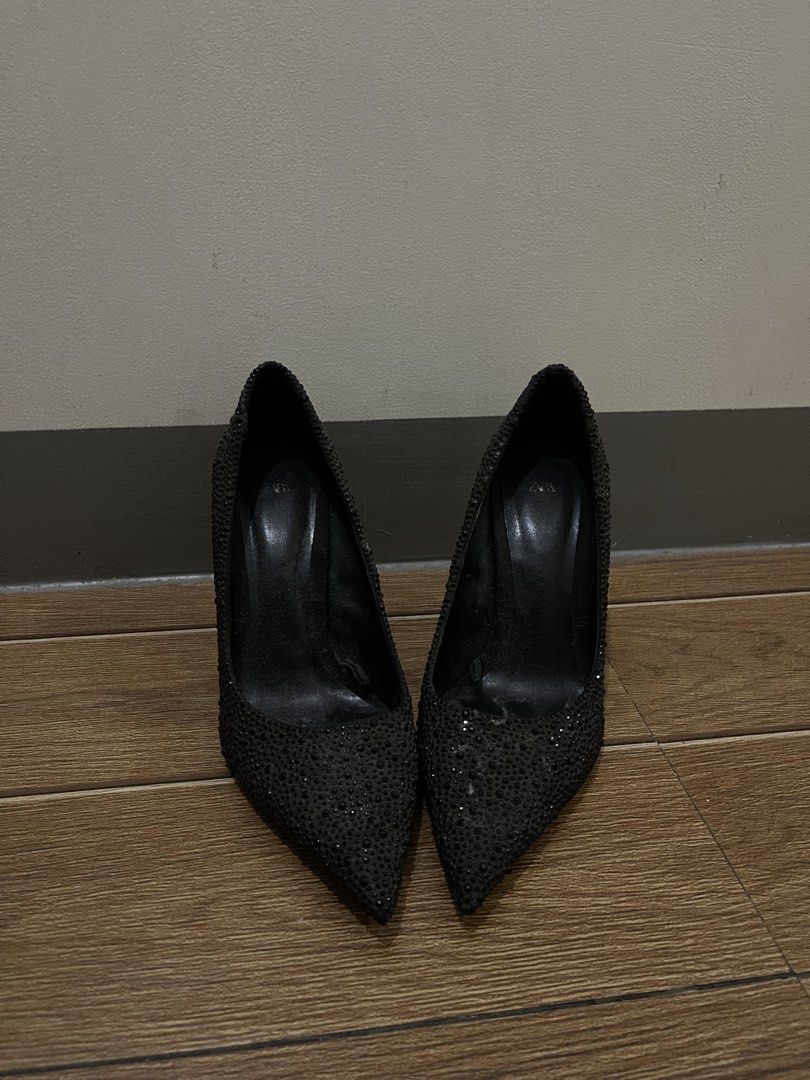 Zara Black Rhinestone Pointed Toe Heels (Category: Heels) located in Quezon City. Submitted by rsomi (Listing ID 1466965271, Image 3). Description: - RFS: Stuck in the closet only Brand: Zara - Color: Black with all-over tiny rhinestones - Style: Pointed toe, high stiletto heels - Details: Classic Zara branding on insoles and silver logo on soles - Condition: Minor scuffs on bottom soles from wear; outer rhinestone texture is 100% intact - Perfec
