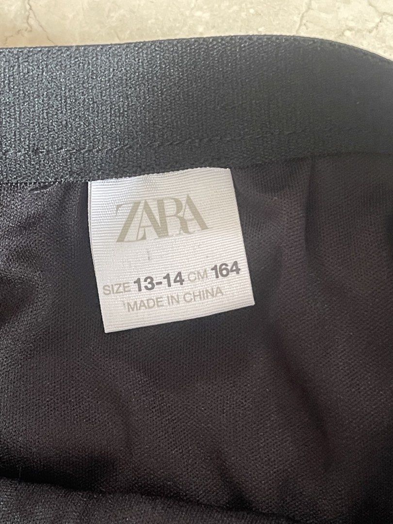 Zara Black Sequin Tiered Skirt (Category: Skirts) located in San Juan City. Submitted by rike_ramirez (Listing ID 1466868837, Image 3). Description: - Brand: Zara - Teen Size: 13-14 years / 164 cm - Color: Black with all-over small sequins - Style: Tiered skirt with layered ruffles for full volume - Waistband: Comfortable elastic slip-on style.