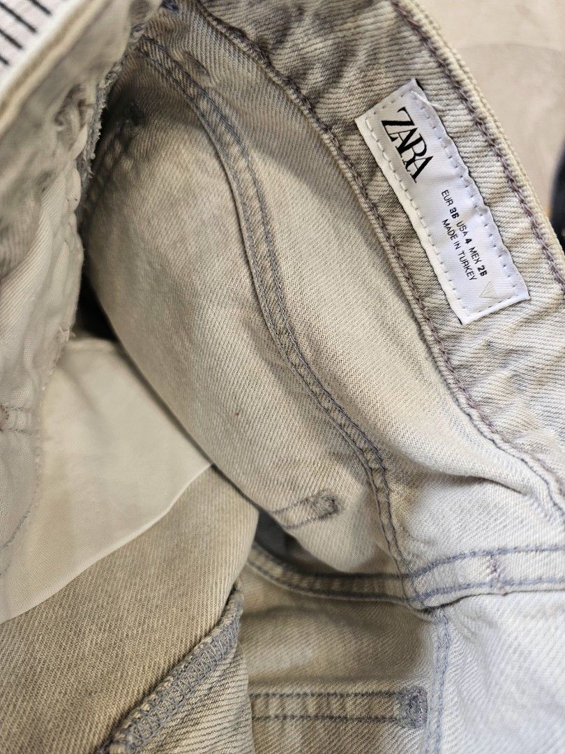 Zara Denim Shorts (Category: Shorts) located in Baguio. Submitted by kayeonlineshop (Listing ID 1466868639, Image 3). Description: Zara loose-fit denim jorts (Bermuda shorts) featuring a distinct vertical paneled panel-seam construction down the sides, a light grey wash, and raw cut or subtly stitched hems w36l18h21.