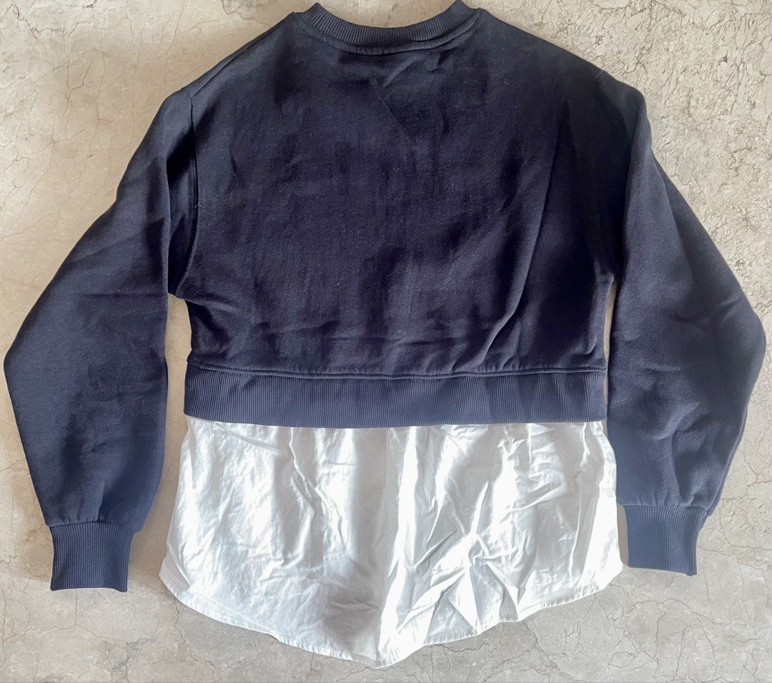 Zara Faux Layered Sweatshirt (Category: Longsleeves) located in San Juan City. Submitted by rike_ramirez (Listing ID 1466869427, Image 2). Description: - Style: Neat preppy layered design with front buttons - Color: Black sweatshirt with white shirt hem - teen Size: 13-14 years / 164 cm - Features: Long sleeves, ribbed cuffs, and neckline - Condition: Clean, well-kept, and comfy for daily wear.