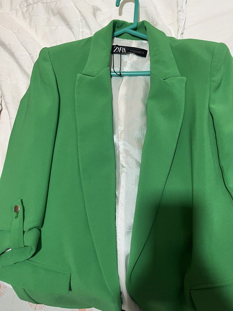 Zara Green Blazer - XS (Category: Coats, Jackets and Outerwear) located in Manila. Submitted by tk555_ (Listing ID 1466781648, Image 2). Description: - Brand: Zara - Size: XS-fits up to Small - Color: Vibrant green with white silky inner lining - Details: Structured lapels, button detail on rolled sleeves - Condition: Clean inside and out, ready to wear - Style: Great pop of color for work or casual outings -Got this for around 3k!.
