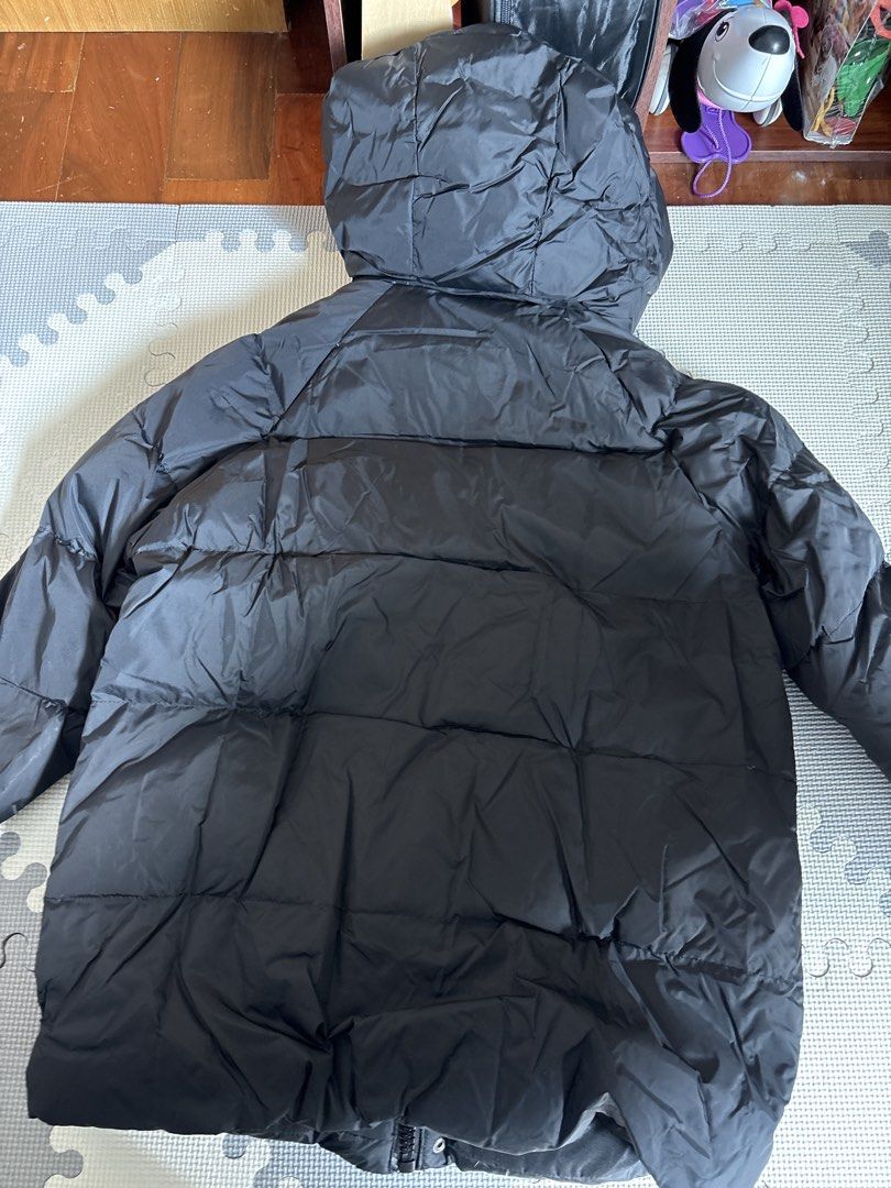 Zara Kids Puffer Jacket Size 8-9 (Category: Babies & Kids Fashion) located in Makati City. Submitted by shoplecloset (Listing ID 1466777482, Image 2). Description: - Brand/Model: Zara Team Hills W22 Urban Trip collection - Size: 8-9 years (130 cm) - Color: Classic black - Design: Thick padded with hooded collar and front button closures - Features: Convenient utility pockets on the chest - Origin: Made in Vietnam - Condition/Use: Ideal for cold w