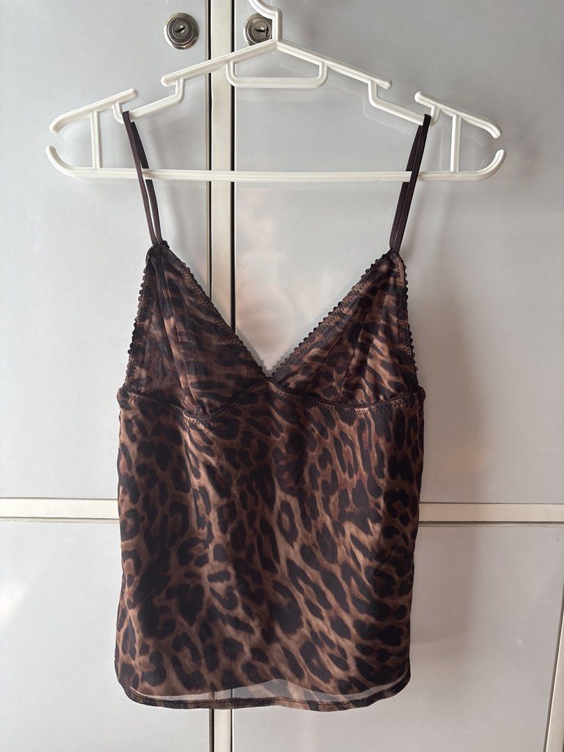 Zara Leopard Print Mesh Cami Top (Category: Sleeveless) located in Manila. Submitted by jodi.declutters (Listing ID 1466783563, Image 1). Description: - Brand: Zara - SRP 1395 - Style: Mesh cami top with brown leopard print - Details: V-neckline with delicate picot trim, adjustable thin straps, inner brown bust lining - Fabric: Lightweight sheer fabric - Size: S (EUR/USA S, MEX 26) - Origin: Made in Turkey - Condition/Use: Great for layering or w