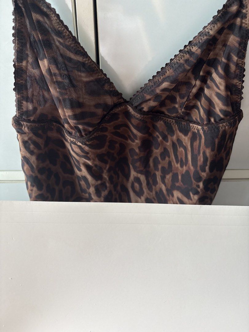 Zara Leopard Print Mesh Cami Top (Category: Sleeveless) located in Manila. Submitted by jodi.declutters (Listing ID 1466783563, Image 2). Description: - Brand: Zara - SRP 1395 - Style: Mesh cami top with brown leopard print - Details: V-neckline with delicate picot trim, adjustable thin straps, inner brown bust lining - Fabric: Lightweight sheer fabric - Size: S (EUR/USA S, MEX 26) - Origin: Made in Turkey - Condition/Use: Great for layering or w