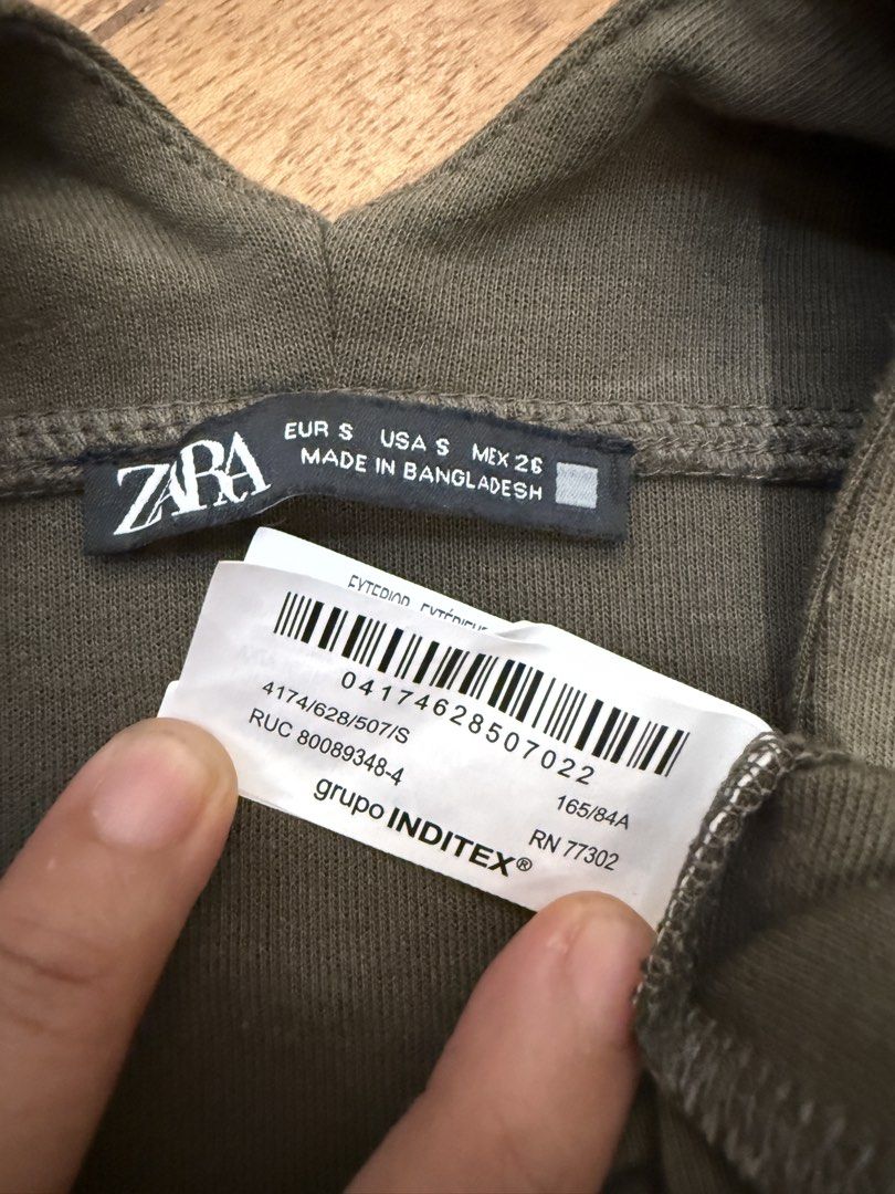 Zara Loose Deep V Neck Olive Green Blouse (Category: Blouses) located in Iloilo. Submitted by dabyladaby2 (Listing ID 1466777801, Image 2). Description: Shoulder-58cm Chest—53cm Length-72cm Store bought.