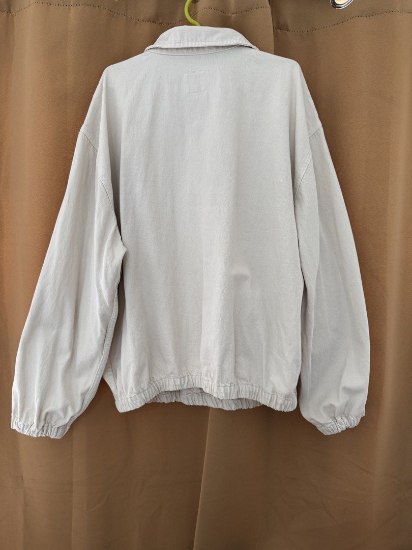 Zara Off-White Quarter Zip Denim Jacket Size M (Category: Coats, Jackets and Outerwear) located in Manila. Submitted by noblephoenix-8959 (Listing ID 1466819185, Image 3). Description: - Brand/Model: Zara Jacket - Size: Medium - Color: Off-white / Clean neutral tone - Material: Sturdy cotton denim (Made in Morocco) - Design: Quarter-zip front with collar and double chest pocket - Fit: Relaxed fit with elasticated hem and cuffs - Style: Perfect fo
