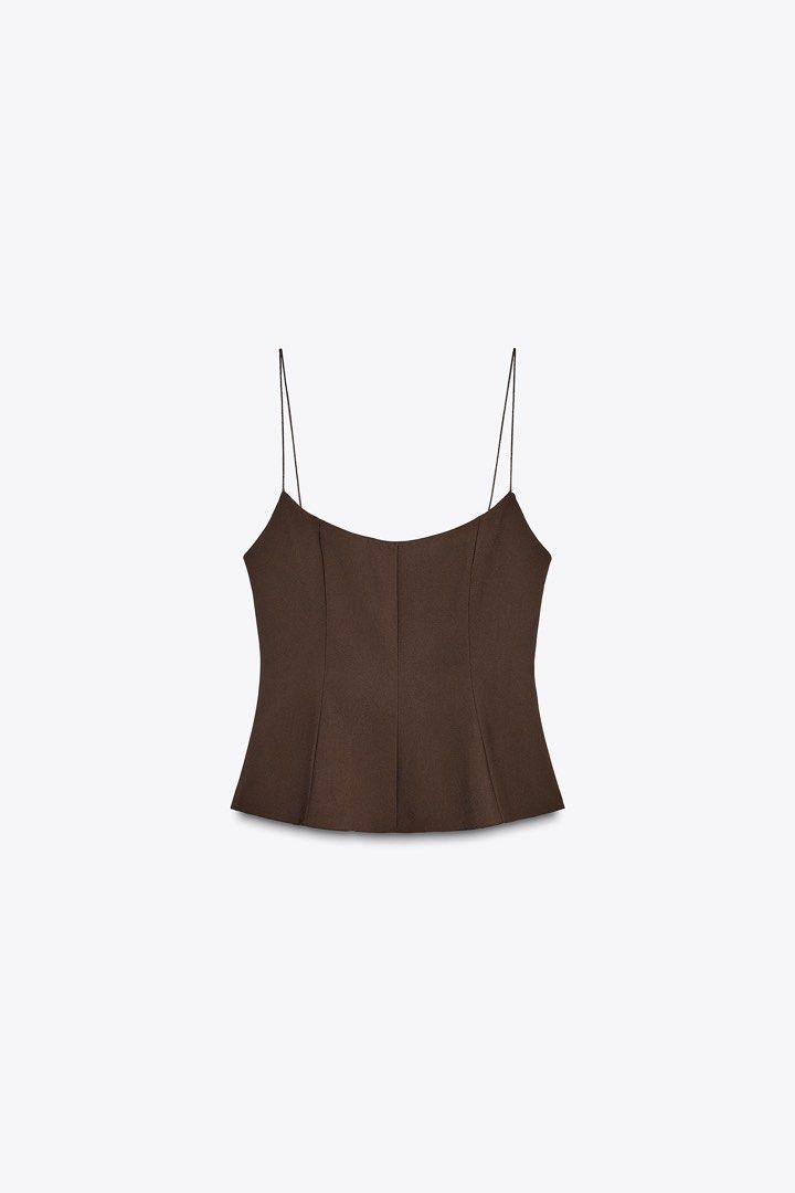 Zara Peplum Top (Category: Blouses) located in Manila. Submitted by shop_lala (Listing ID 1466871455, Image 2). Description: XS on tag Color brown With zipper at side No flaws Used only twice Selling for my sister 🩷 Shipping via lalamove coming from Makati.