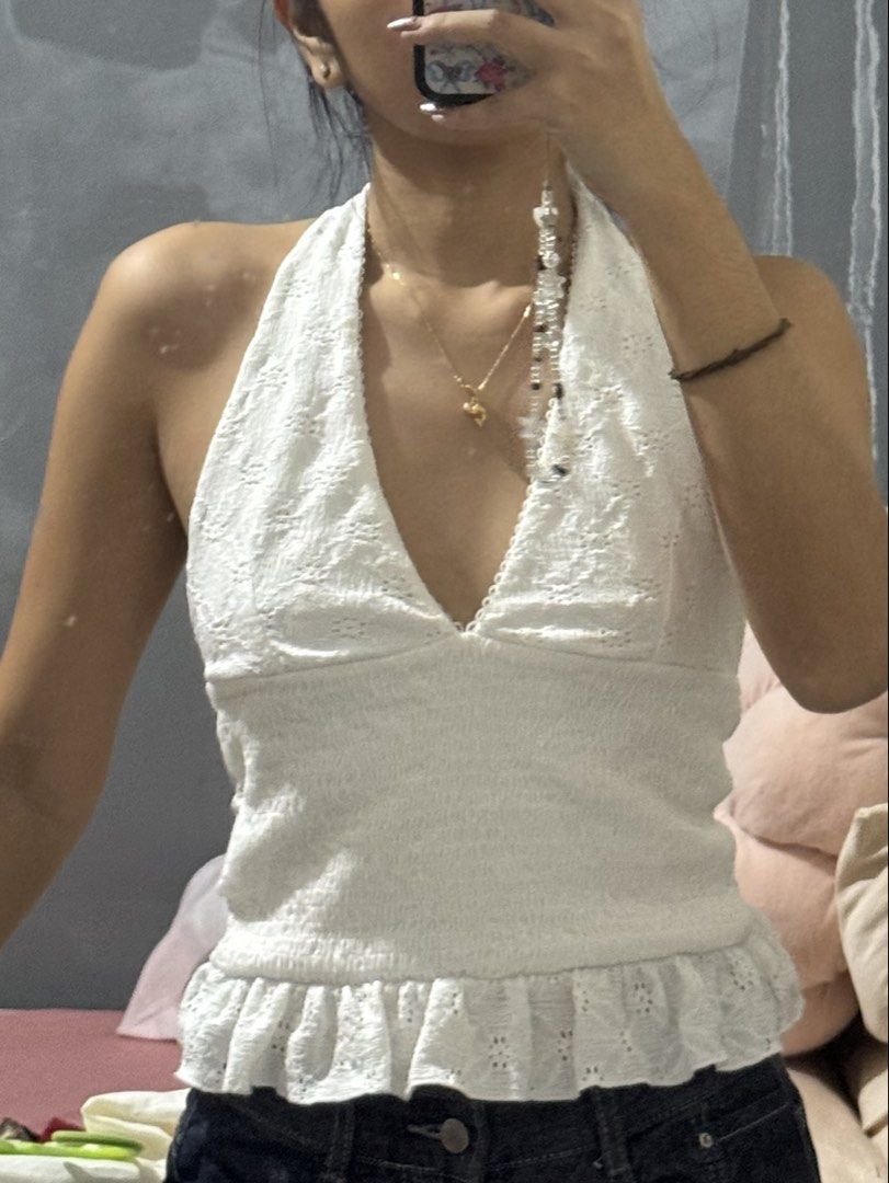 zara white eyelet backless halter top with ruffle hem (Category: Sleeveless) located in Santa Rosa. Submitted by lovedby.gwy (Listing ID 1466838986, Image 2). Description: - size on tag is small but can fit up to medium to semi large body frame - stretchy and airy fabric - rfs: too loose on me now cos i lost weight.