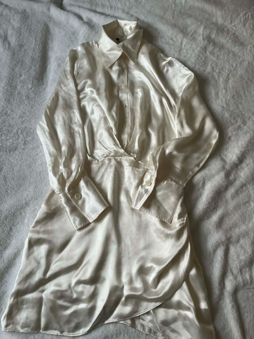 Zara white satin wrap dress (Category: Dresses) located in Pasig City. Submitted by closet_reframe (Listing ID 1466779850, Image 2). Description: Brand new, Zara white satin wrap dress. Satin fabric has a smooth feel and nice flow when worn. Clean finish with well-made stitching and a flattering wrap design. with tags. Shoes are also for sale! S: L.