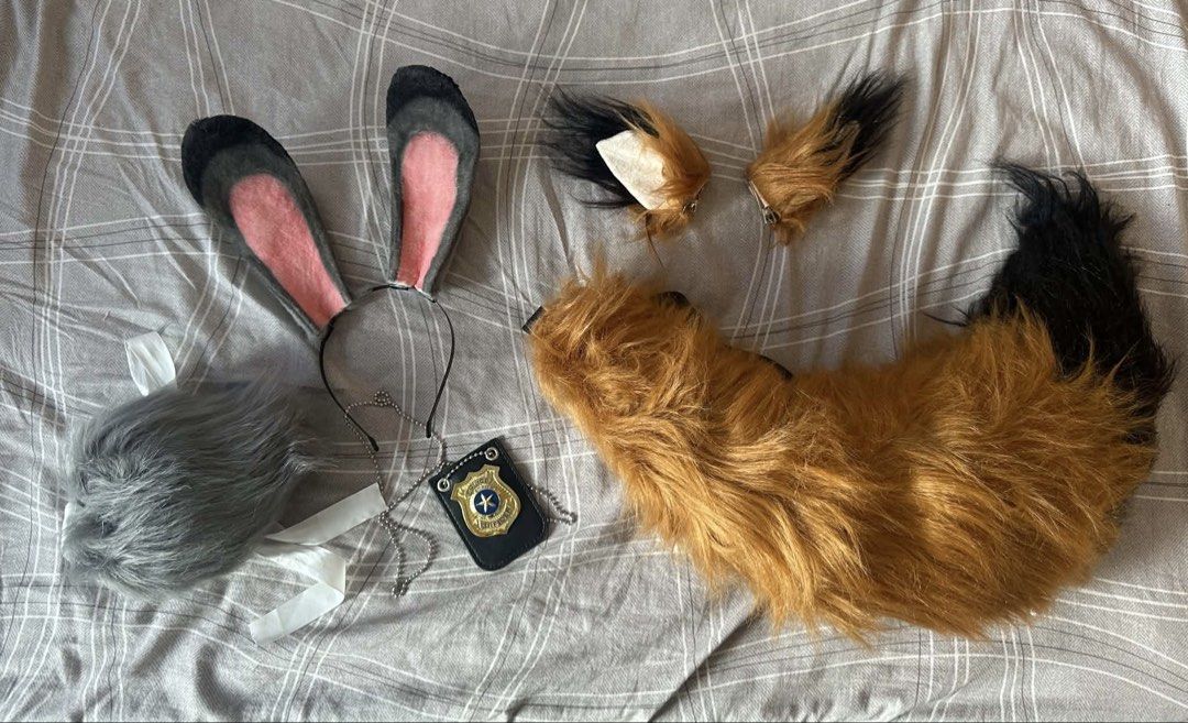 Zootopia Nick Wilde and Judy Hopps Set (Category: Sets or Coordinates) located in Makati City. Submitted by markopolo_preloved (Listing ID 1466860560, Image 1). Description: - Complete Zootopia couple cosplay set: Nick Wilde & Judy Hopps - Nick: Fox Ears & Tail (purchased at ₱926) - Judy: Bunny Ears & Tail (purchased at ₱905) - Judy Police badge (purchased at ₱138) - Total ₱1,969 but selling all for only ₱1,299 - Save ₱670 - Material: Soft faux f