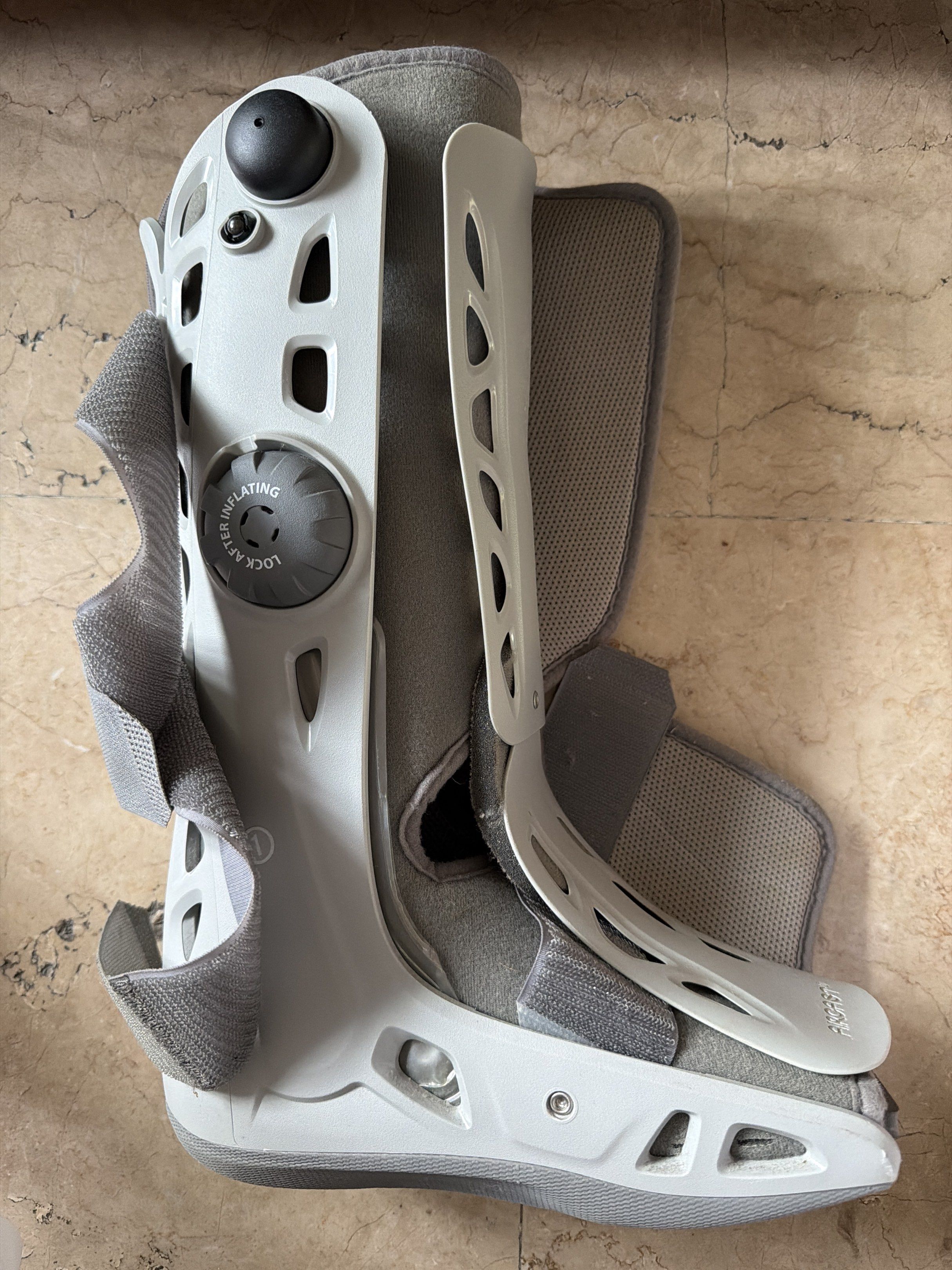 Aircast Walking Boot with Heel Wedge (Category: Medical Supplies & Tools) located in Manila. Submitted by yournextshop (Listing ID 1419042062, Image 1). Description: - Aircast walking boot for foot and ankle support. - Designed for foot and ankle injuries. - Features adjustable straps and air chambers. - Includes a heel wedge for added support. - Heel wedge sizes: RT, S, M, L. - Condition: Good. - Size: Not specified..