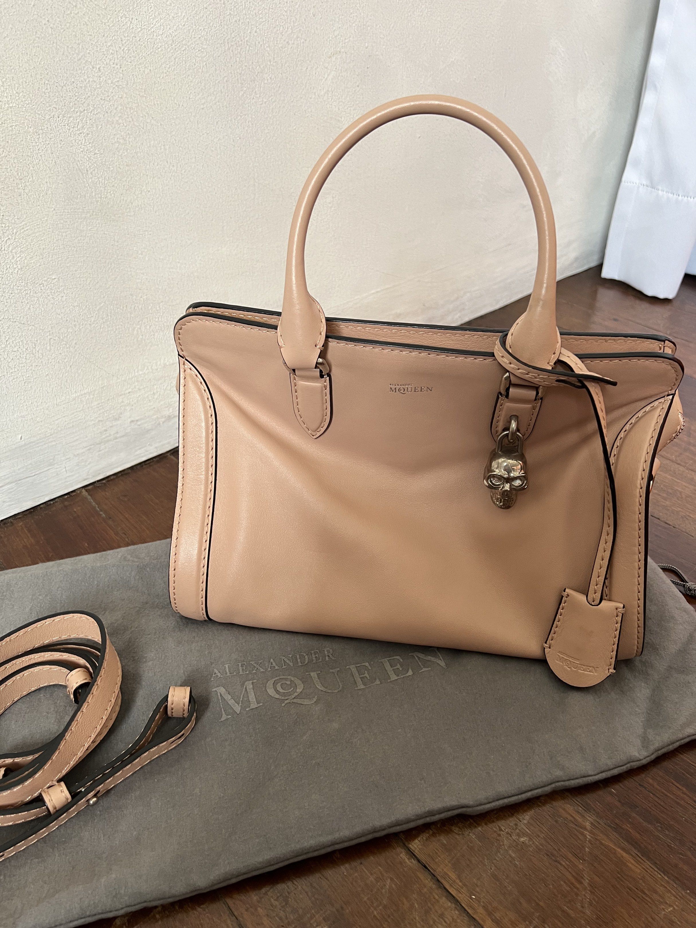Alexander McQueen Padlock Satchel (Category: Luxury Bags & Wallets) located in Quezon City. Submitted by kdiv_ (Listing ID 1419030736, Image 2). Description: Personal preloved | Guaranteed Authentic Bought in Saks Fifth NYC Small in Pink, Calkskin Leather Inclusions: Dust bag and Strap RFS: Decluttering, no longer being used MOP: BDO/GCash Shipping fee to be shouldered by the buyer.