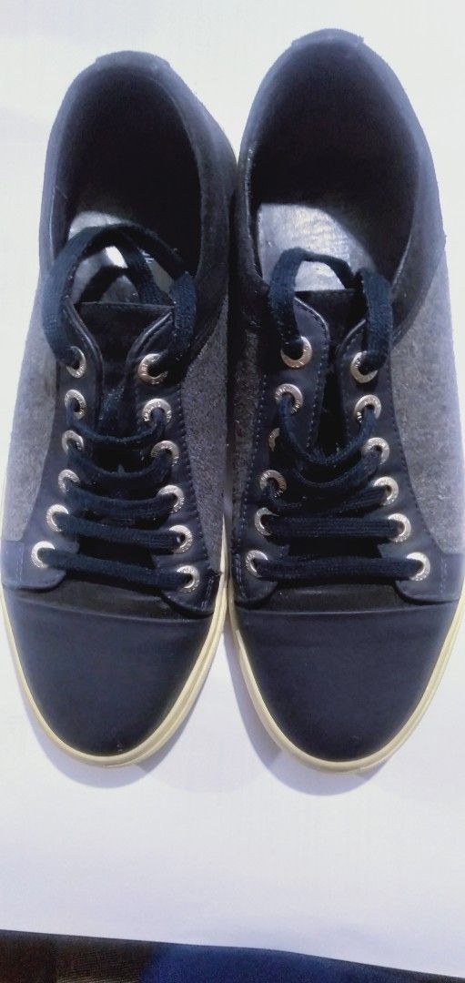 Antony Morato Navy Sneakers - Size 43 (Category: Sneakers) located in Naga. Submitted by pec3c (Listing ID 1419085486, Image 1). Description: - Antony Morato navy sneakers - Navy and grey upper - Made in Italy - White contrasting sole - Lace-up closure with silver eyelets - Size 43 - Classic design for casual wear.