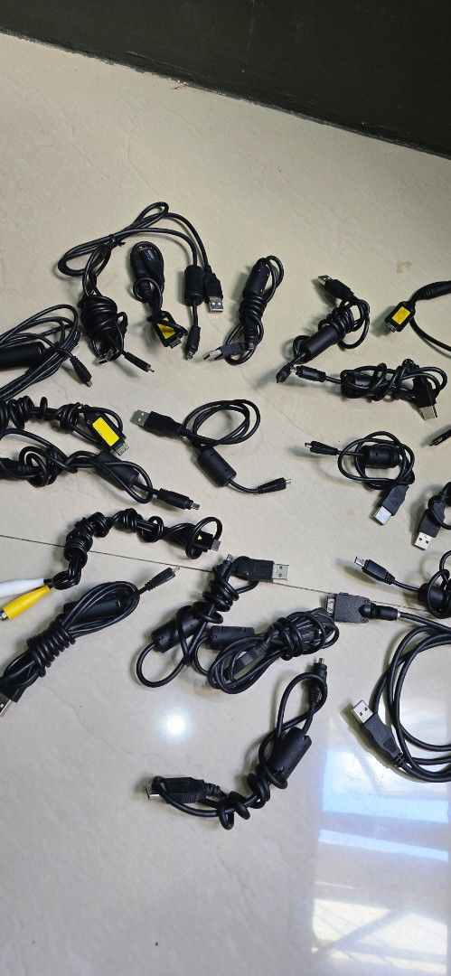 Assorted Cables - USB, AV, and More (Decluterring) (Category: Cables & Adaptors) located in Pasig City. Submitted by da_stone (Listing ID 1419034269, Image 2). Description: - Includes USB, micro USB, and AV cables - Variety of lengths and connector types - Ideal for charging phones, tablets, and other devices - Connect to TVs and other devices - Great for replacement or extra cables - Sold as a complete set.