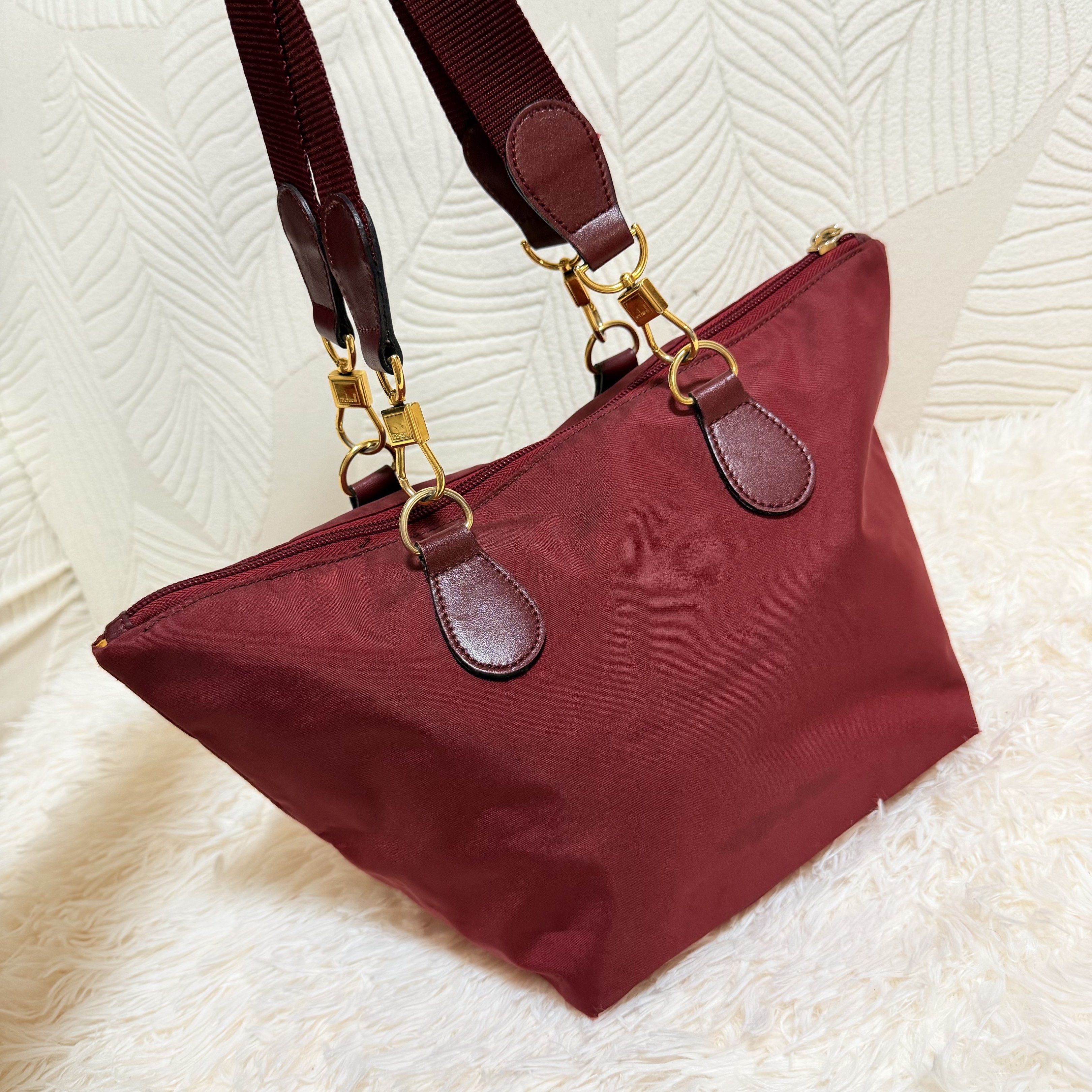 Authentic Vintage Moschino Reversible Tote Bag (Category: Luxury Bags & Wallets) located in Pasig City. Submitted by trendapparelph (Listing ID 1418993836, Image 2). Description: - Stylish Moschino tote bag - Vibrant color - Top zipper closure - Dual top handles - Gold-tone hardware - Lined interior with small pocket - Rectangular Moschino logo - Made in Italy by Redwall.