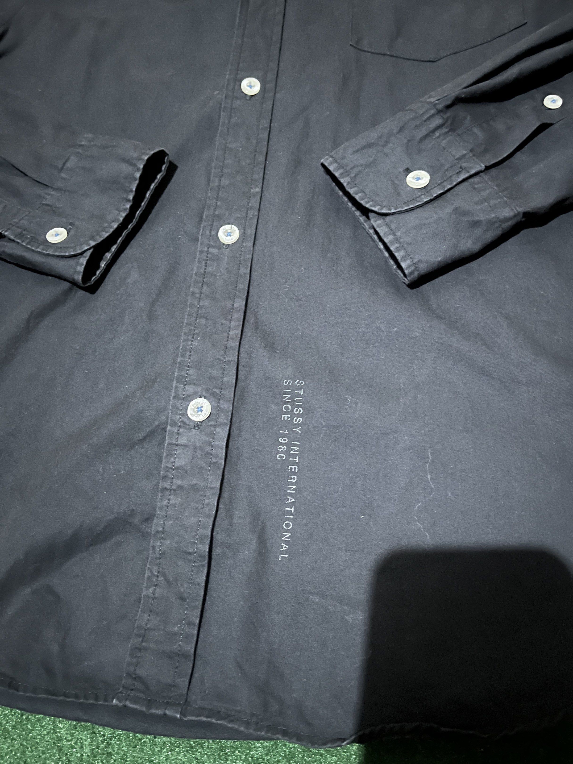 Black Long Sleeve Button-down Shirt with Checkered Stripe on the Button (Category: Formal Shirts) located in Bacolod City. Submitted by chrlsmlns (Listing ID 1419159733, Image 3). Description: HIGHLIGHTS: - Stussy long sleeve shirt - Button-down style - Plaid pattern on collar and placket - Features a chest pocket - Stussy International logo on front - Made in China - Small on Tag (best fit Medium).