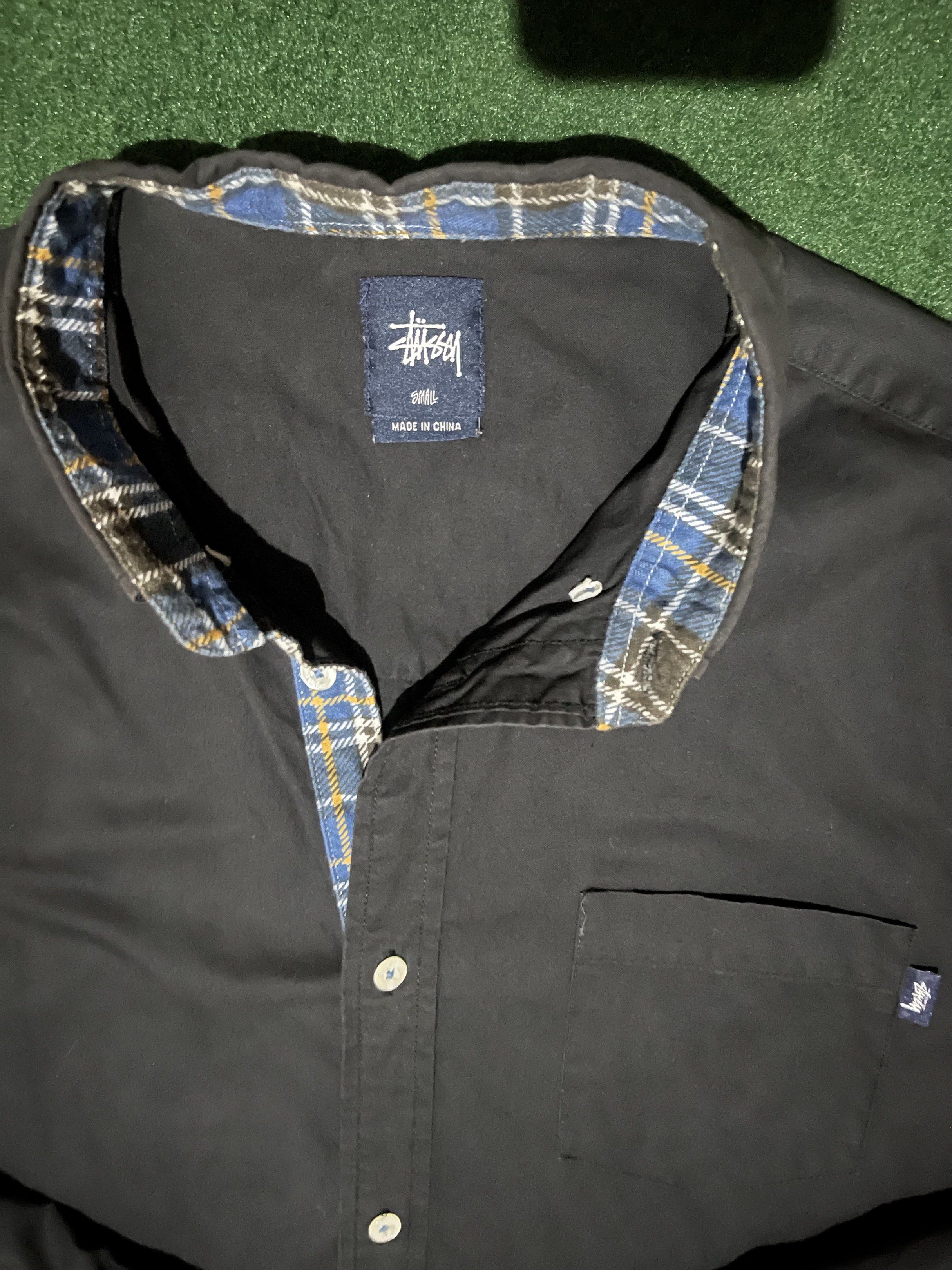 Black Long Sleeve Button-down Shirt with Checkered Stripe on the Button (Category: Formal Shirts) located in Bacolod City. Submitted by chrlsmlns (Listing ID 1419159733, Image 2). Description: HIGHLIGHTS: - Stussy long sleeve shirt - Button-down style - Plaid pattern on collar and placket - Features a chest pocket - Stussy International logo on front - Made in China - Small on Tag (best fit Medium).