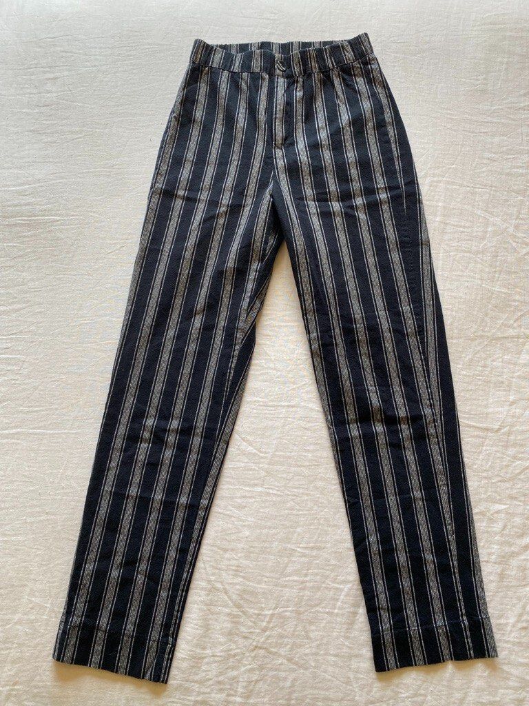 Brandy Melville Tilden Black Striped Pants (Category: Other Bottoms) located in Manila. Submitted by frftch (Listing ID 1419009716, Image 1). Description: - Brand: Brandy Melville - Style: Striped pants - Closure: Button and zipper - Design: Classic striped pattern with slit at the bottom - Elastic waist, stretches a little - 24 width + (brandy size) .