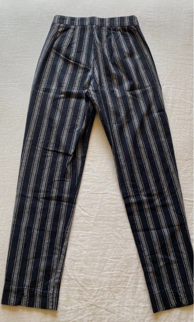 Brandy Melville Tilden Black Striped Pants (Category: Other Bottoms) located in Manila. Submitted by frftch (Listing ID 1419009716, Image 2). Description: - Brand: Brandy Melville - Style: Striped pants - Closure: Button and zipper - Design: Classic striped pattern with slit at the bottom - Elastic waist, stretches a little - 24 width + (brandy size) .