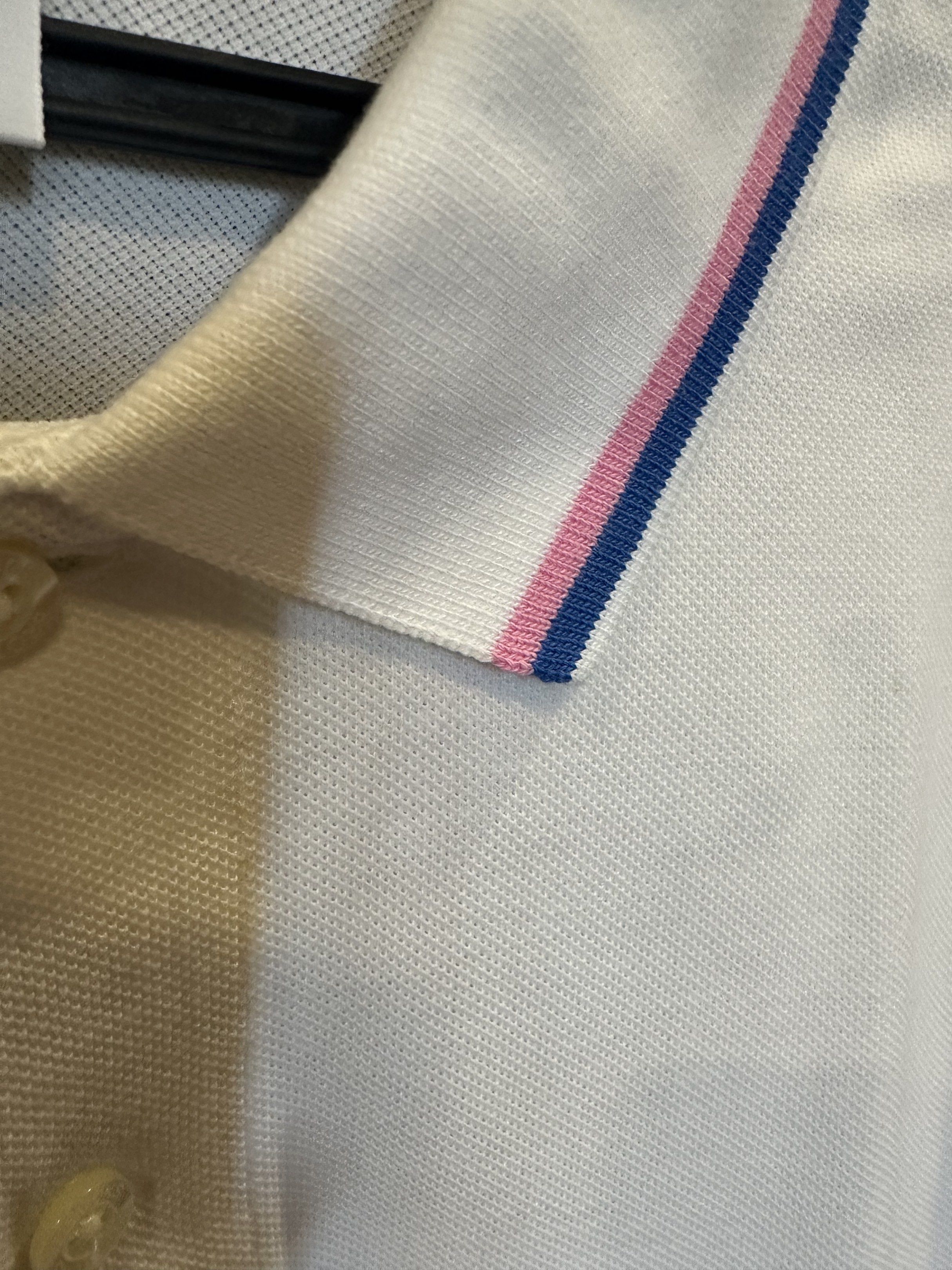 Brooks Brothers Performance Polo Shirt - M (Category: Tshirts & Polo Shirts ) located in Paranaque City. Submitted by mrbentables (Listing ID 1419071223, Image 3). Description: - Brooks Brothers Performance Polo Shirt - Size: M - Fit: Slim - Material: 100% Cotton - Collar: Striped (Blue & Pink) - Features the Brooks Brothers logo on the chest.