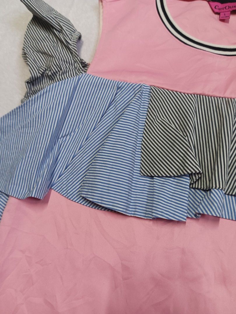 CarrOussl Pink Ruffle Dress - Large (Category: Dresses) located in Malabon City. Submitted by mslalan (Listing ID 1419107882, Image 2). Description: - Pink dress with a round neckline. - Contrasting black and white trim. - Unique ruffle detailing in blue and black striped fabric on chest and shoulders. - Sleeveless design. - Comfortable and casual style..