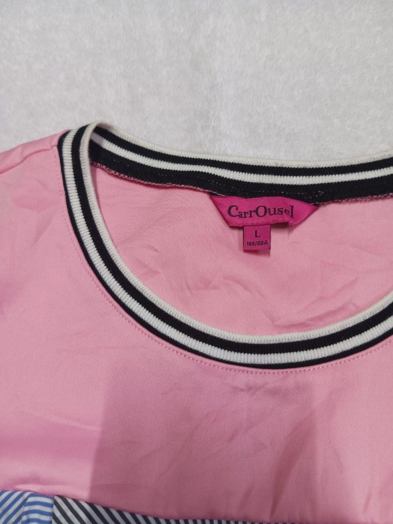 CarrOussl Pink Ruffle Dress - Large (Category: Dresses) located in Malabon City. Submitted by mslalan (Listing ID 1419107882, Image 3). Description: - Pink dress with a round neckline. - Contrasting black and white trim. - Unique ruffle detailing in blue and black striped fabric on chest and shoulders. - Sleeveless design. - Comfortable and casual style..