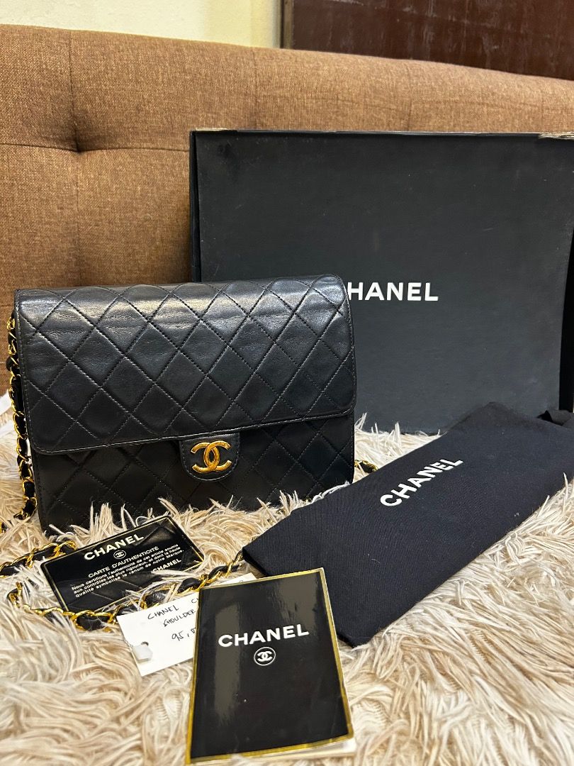 Chanel Classic Flap Shoulder Bag (Category: Luxury Bags & Wallets) located in Caloocan City. Submitted by piamariemo11606 (Listing ID 1419109111, Image 2). Description: - Authentic Chanel Classic Flap shoulder bag - Black, quilted design - Gold-tone chain strap - Iconic CC turn-lock closure - Includes original box, dust bag, and authenticity cards - Red leather interior with zippered pocket.