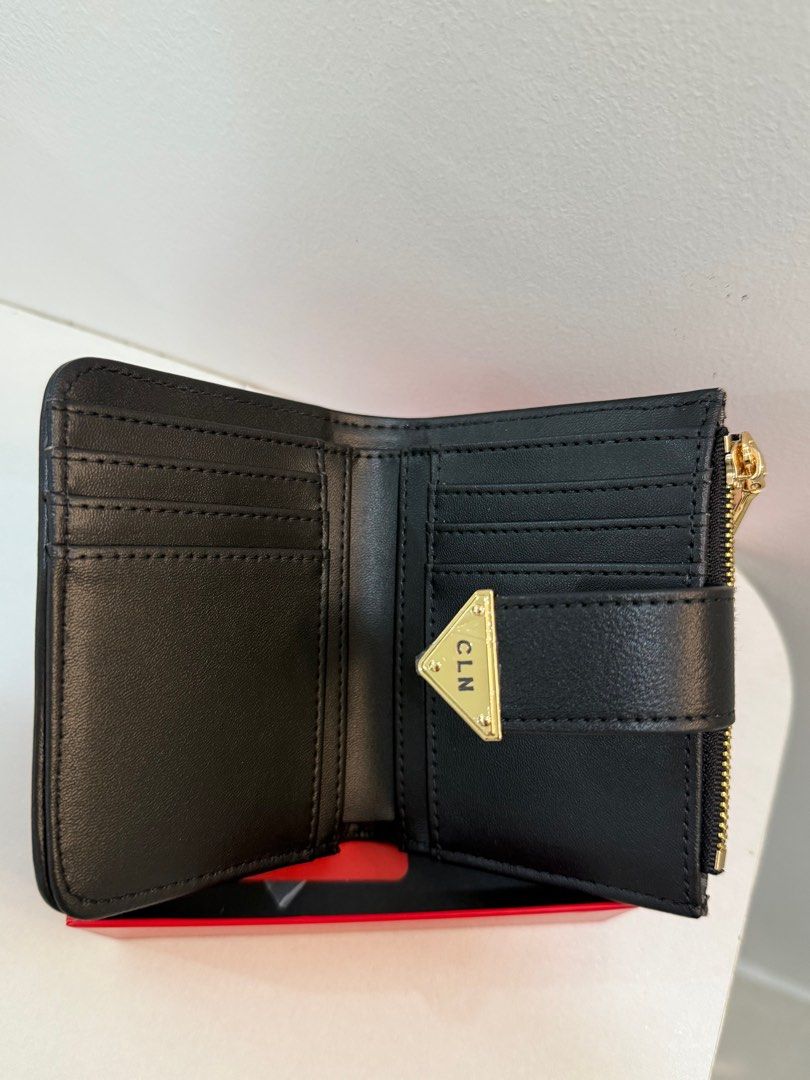 CLN ‘rose’ wallet (Category: Wallets & Card holders) located in Dasmarinas. Submitted by chiahseed (Listing ID 1419066675, Image 3). Description: CLN ‘rose’ wallet - ORIGINAL PRICE: 799 - Brand new, never been used! - Comes with complete inclusions: dust bag, paper bag, and box - In perfect condition. Stored properly since purchase. rfs: originally purchased as a gift for my mom, but she prefers long wallets. MOP: gcash.