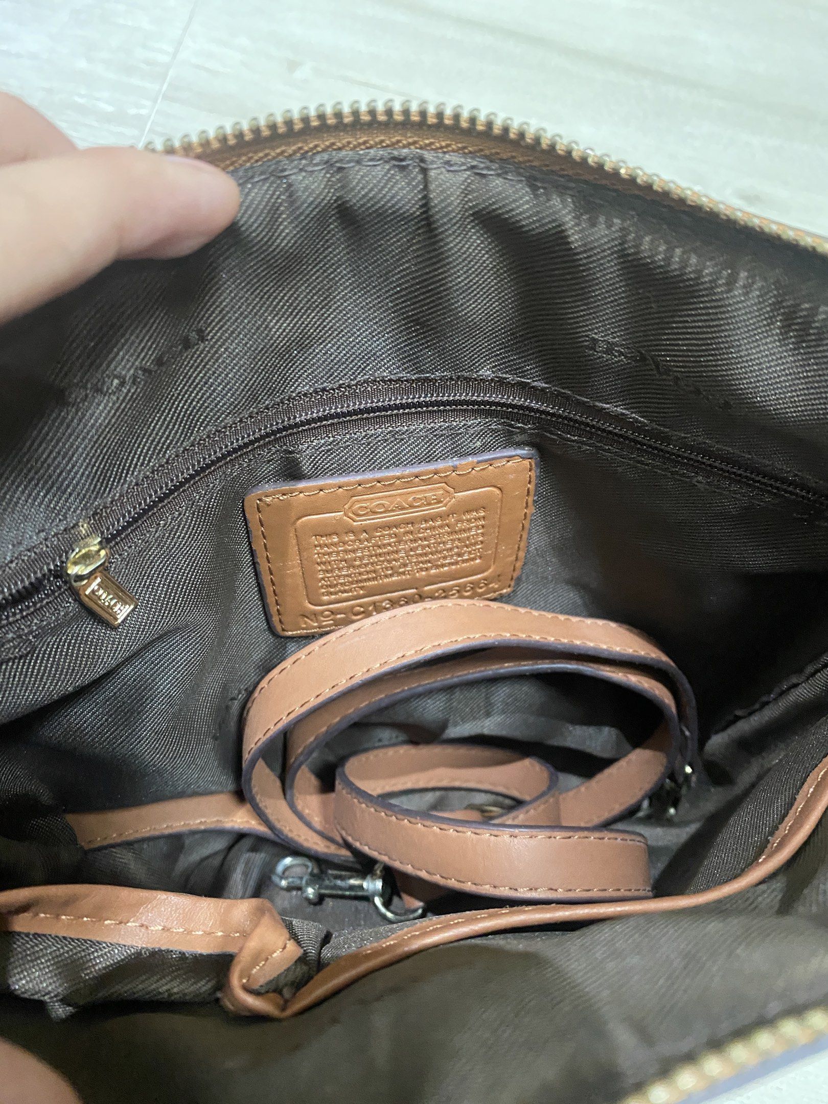 Coach Cherry Print Crossbody Bag (Category: Luxury Bags & Wallets) located in Quezon City. Submitted by itteliashp (Listing ID 1419127204, Image 2). Description: - Coach crossbody bag with cherry print .