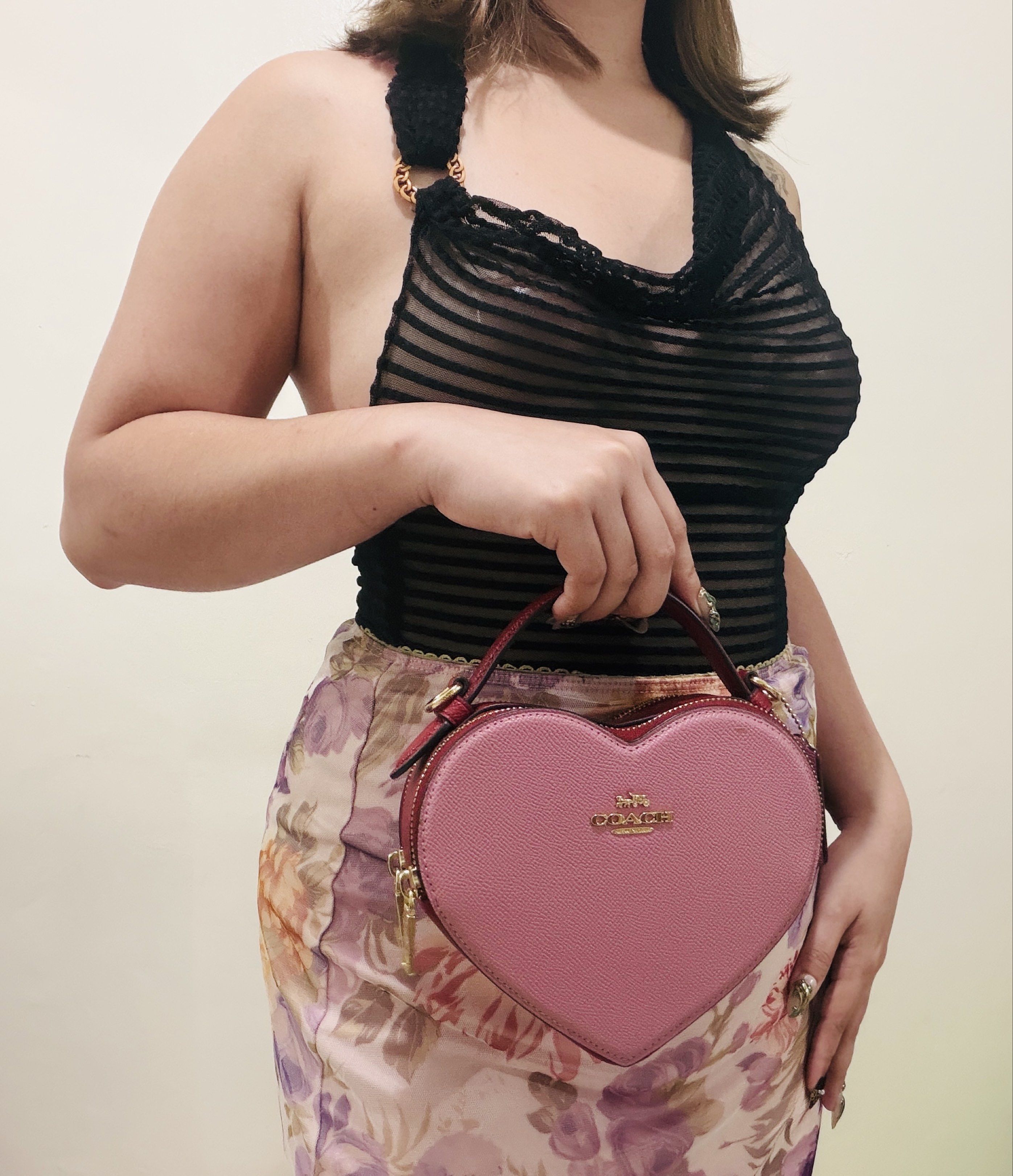 Coach Heart Crossbody in pink (Category: Purses & Pouches) located in Quezon City. Submitted by findme.ph (Listing ID 1419081760, Image 1). Description: Only used twice on a special occasion. Perfect for valentines Price slightly negotiable QC area.