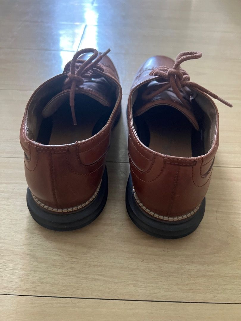 Cole Haan Grand Wingtip Oxford (Category: Dress Shoes) located in Manila. Submitted by ytoci (Listing ID 1419024327, Image 3). Description: - Cole Haan wingtip woodbury java mens wide size 9 -no box (disposed) - Classic wingtip design with intricate detailing - Lace-up closure - Cushioned sole for comfort - Black soles with Cole Haan Grand OS branding - Made of leather.