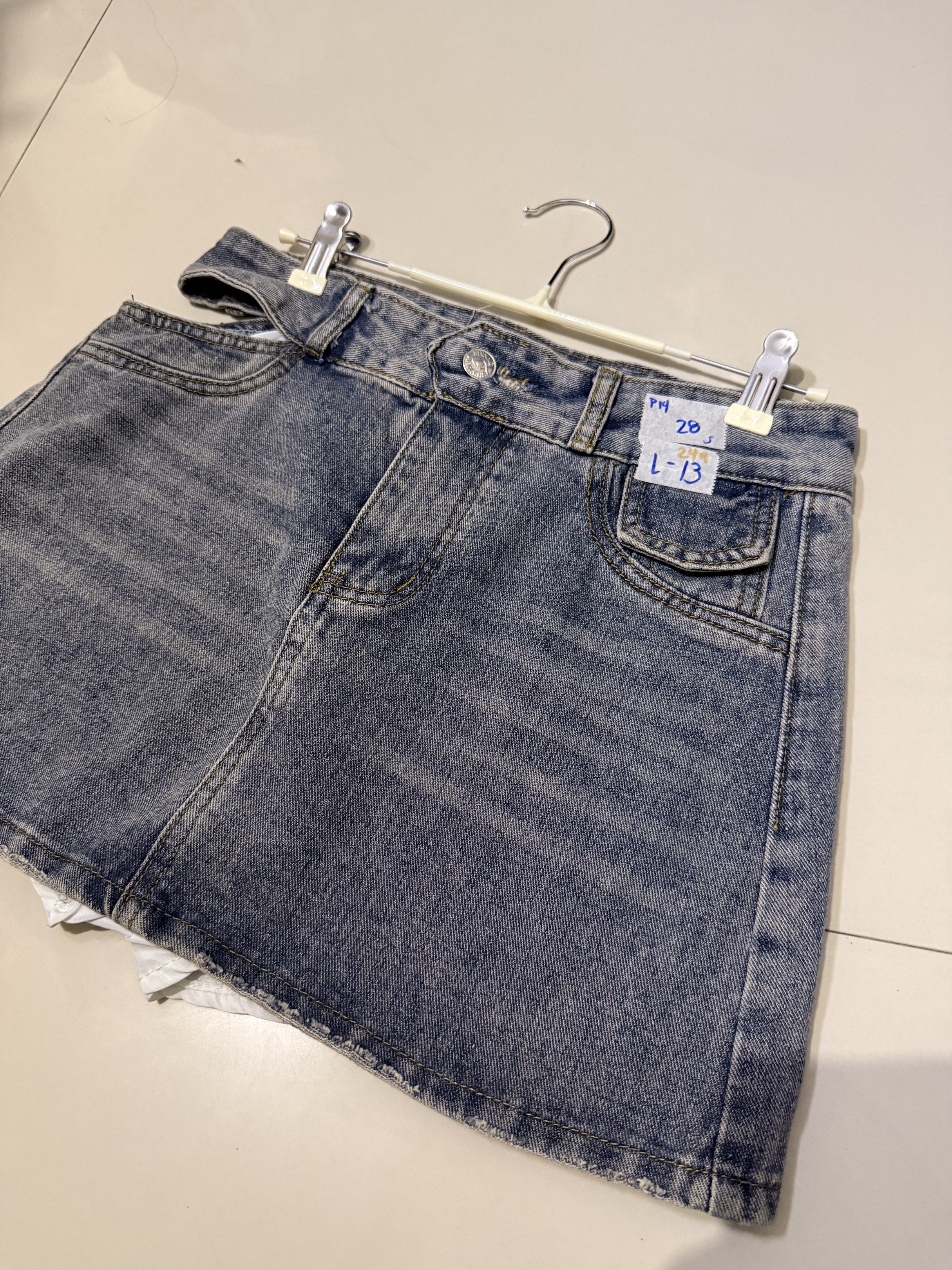 Denim Mini skort with Cutout Detail (Category: Skirts) located in Baliuag. Submitted by lifewithkleng (Listing ID 1419159030, Image 3). Description: - Denim mini skirt - Unique cutout design - Classic five-pocket style - Button closure - Size: 28 Medida - length 13inch - Perfect for casual or night-out looks.