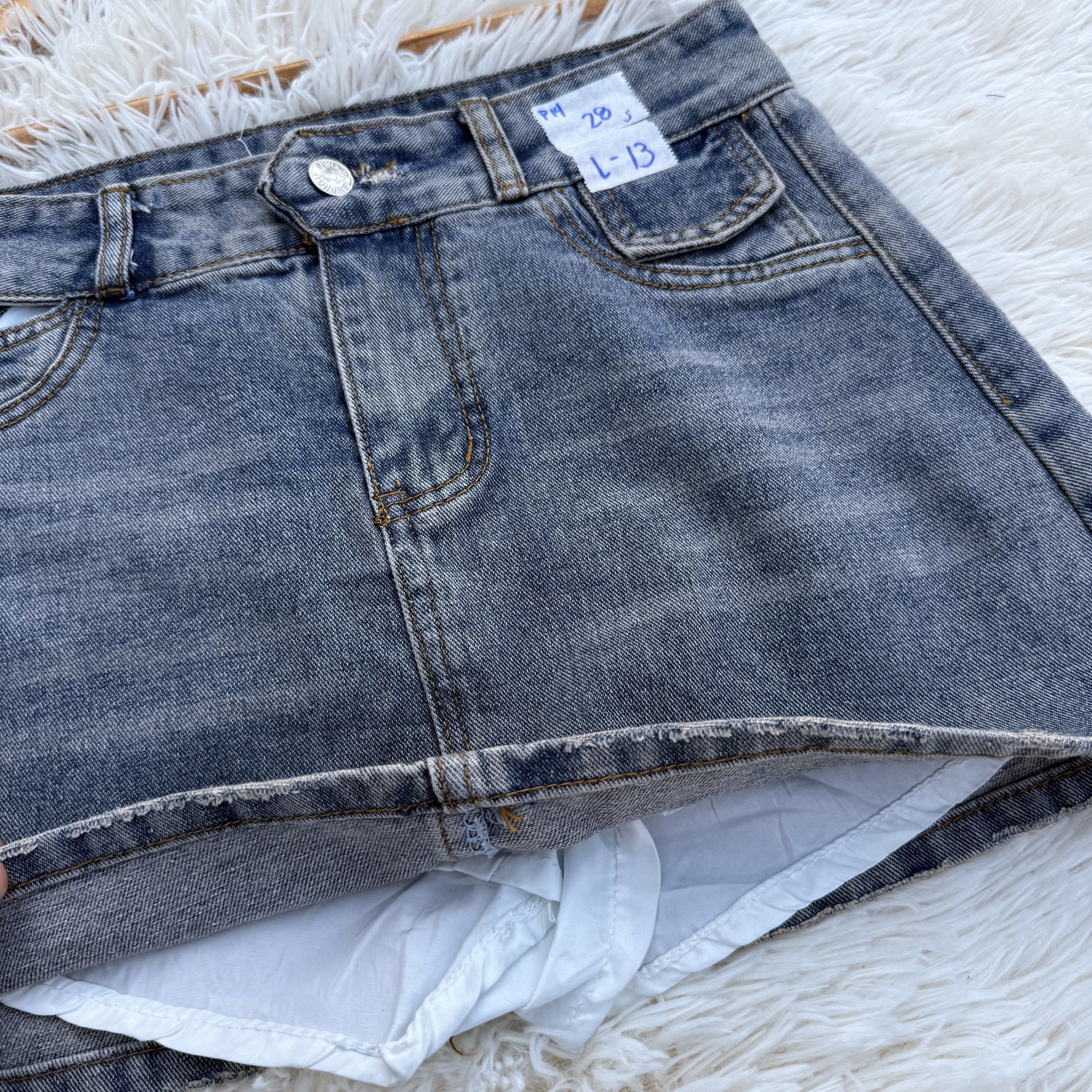 Denim Mini skort with Cutout Detail (Category: Skirts) located in Baliuag. Submitted by lifewithkleng (Listing ID 1419159030, Image 2). Description: - Denim mini skirt - Unique cutout design - Classic five-pocket style - Button closure - Size: 28 Medida - length 13inch - Perfect for casual or night-out looks.