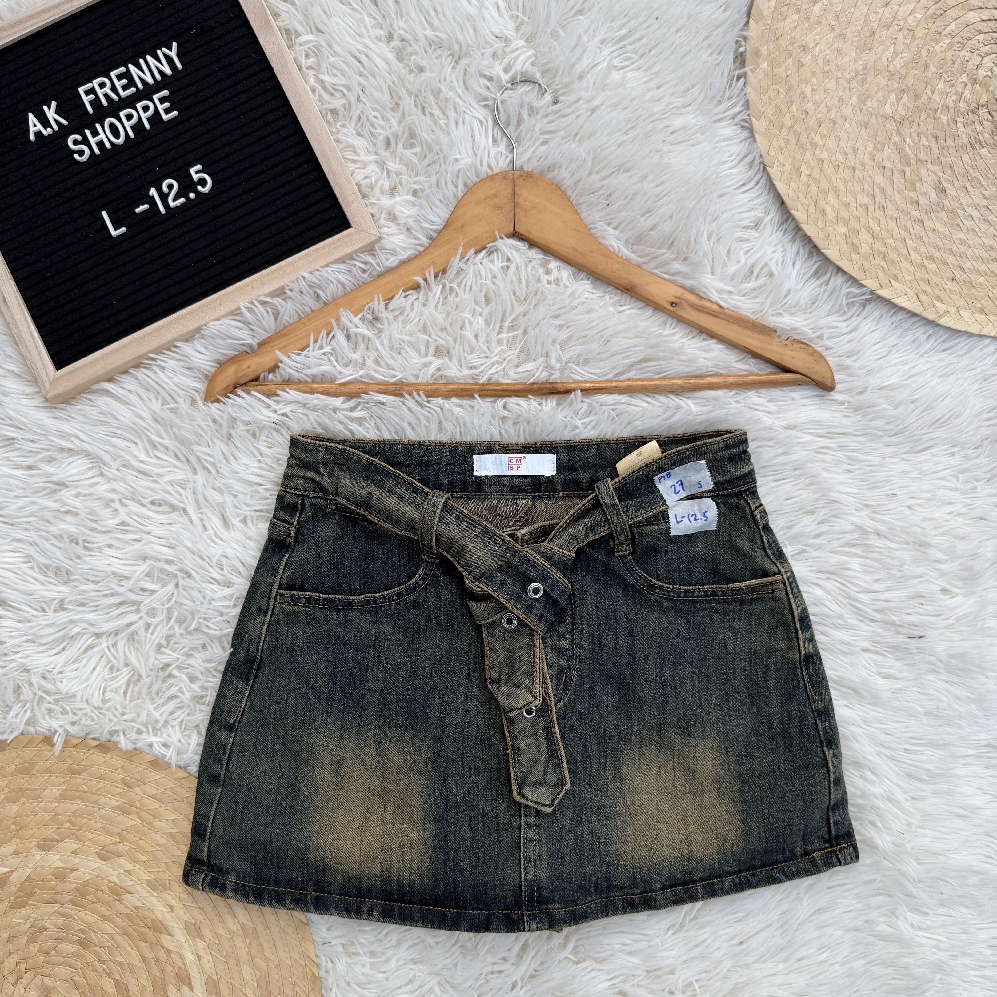 Denim Skirt with Belt (Category: Skirts) located in Baliuag. Submitted by lifewithkleng (Listing ID 1419157724, Image 1). Description: - Denim skirt with belt detail - Faded wash effect - Button closure - Two front pockets - Size: L (12.5) - Ideal for casual outfits.