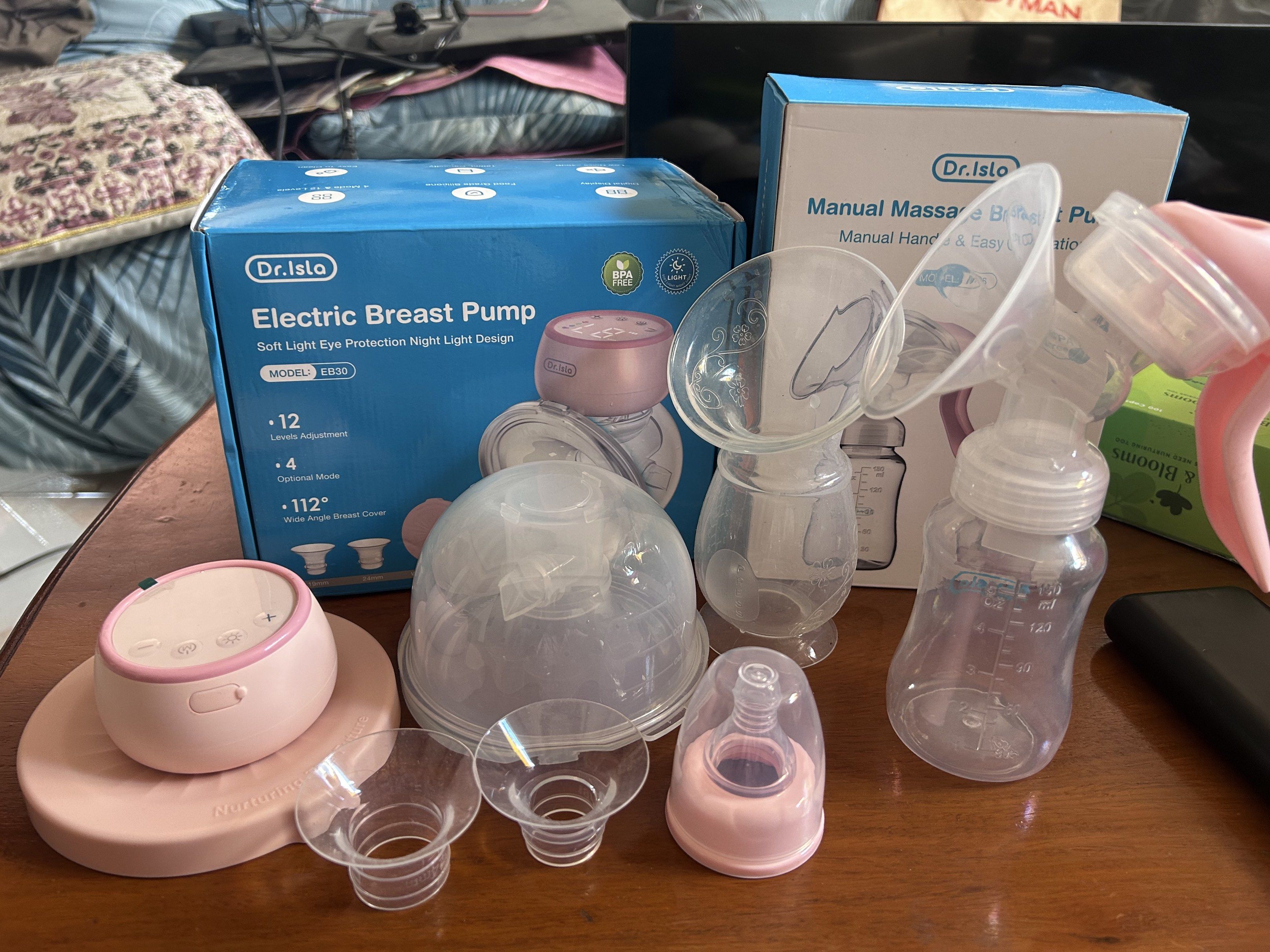 Dr. Isla Electric and Manual Breast Pump (Category: Breastfeeding & Bottle Feeding) located in Cabanatuan. Submitted by krnlim (Listing ID 1419009483, Image 1). Description: - Dr. Isla Breast Pump Set - Includes: - Electric Breast Pump: - Soft light and night light - 12 adjustable levels - 4 modes - Manual Breast Pump RFS : not pumping anymore.