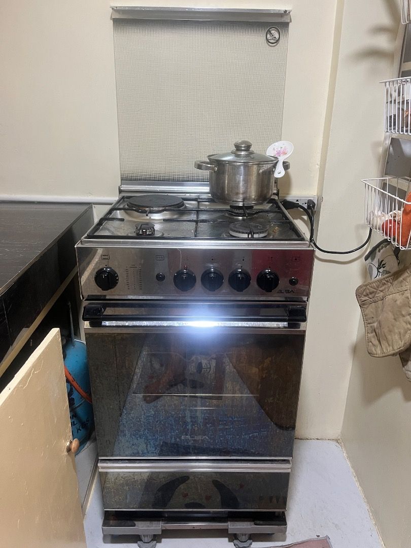 Elba Gas and Electric Stove (Category: Cookware & Accessories) located in Imus. Submitted by joancorte66541 (Listing ID 1419116616, Image 2). Description: - Elba stove with gas and electric burners and oven - Stainless steel finish - Includes protective cover - Multiple control knobs - Standard size, suitable for kitchen use Used for more than 1 year only Rfs: Di need ng oven. Kaya magdowngrade.