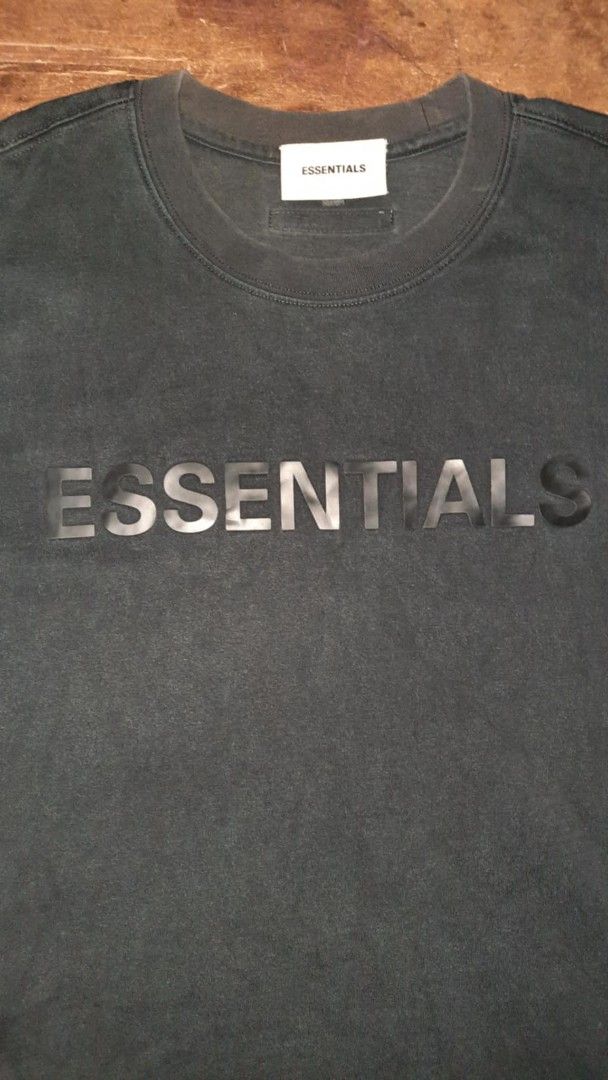 Fear of God Essentials Black Tee (Category: Tshirts & Polo Shirts ) located in Narvacan. Submitted by thrift_look (Listing ID 1419127728, Image 2). Description: - Fear of God Essentials t-shirt.. - Features the Essentials logo on the front - Classic crew neck design - Comfortable short sleeves - Made from a soft, high-quality material.