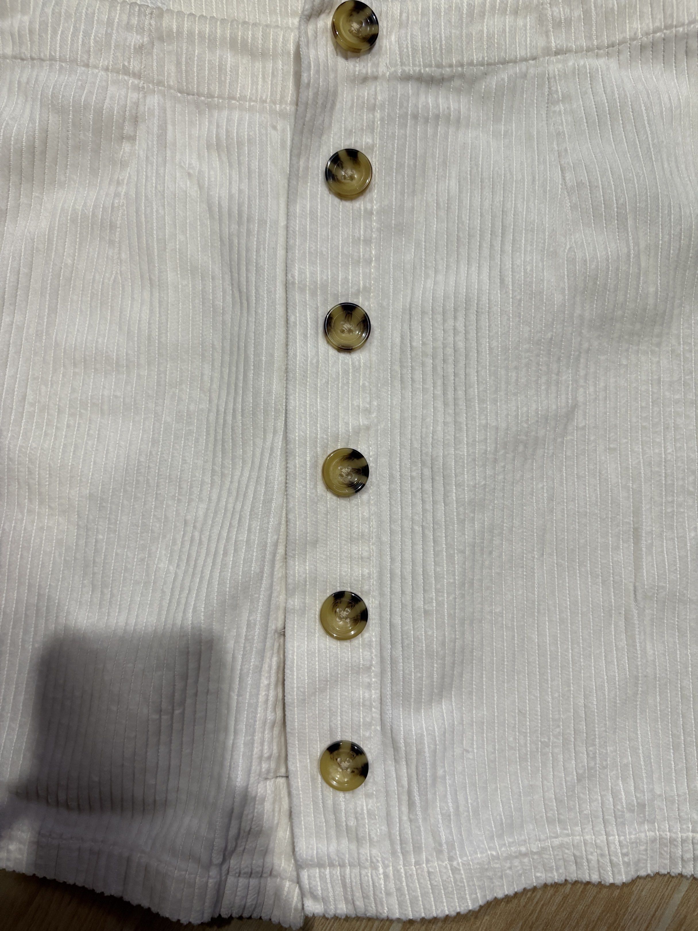 Forever 21 Corduroy Skirt (Category: Skirts) located in Manila. Submitted by dkarchives (Listing ID 1419074981, Image 2). Description: Forever 21 Corduroy skirt - white color - with front buttons - length: 39cm.